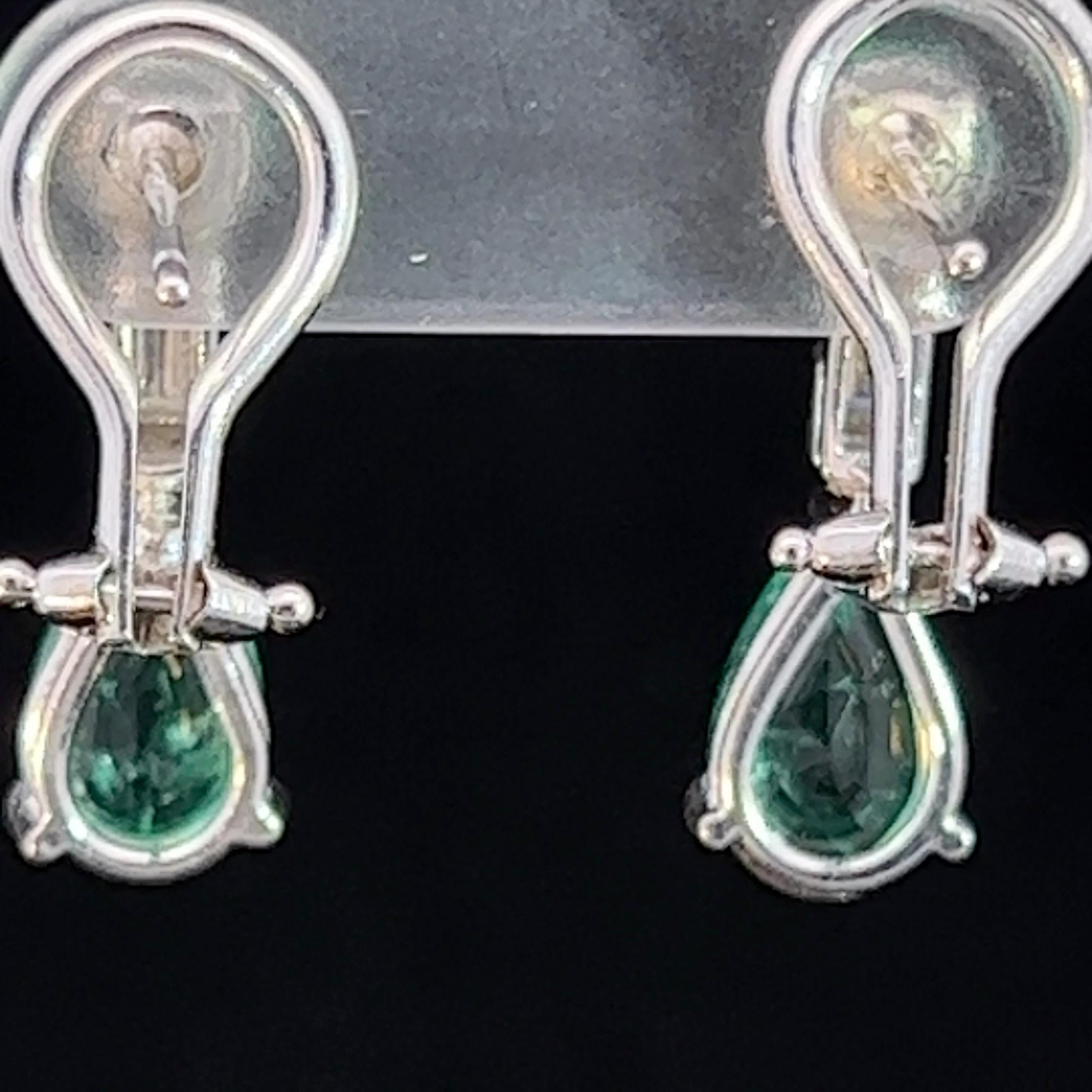 Modern Emerald & Diamond Platinum Earrings Circa 2000s For Sale 1