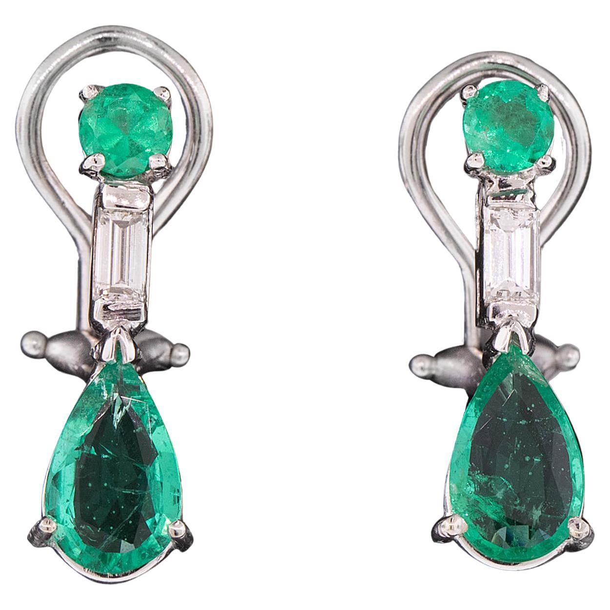 Modern Emerald & Diamond Platinum Earrings Circa 2000s For Sale