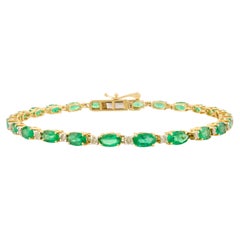 Bracciale tennis moderno con smeraldo e diamanti in oro giallo massiccio 14k Gioielli di pregio