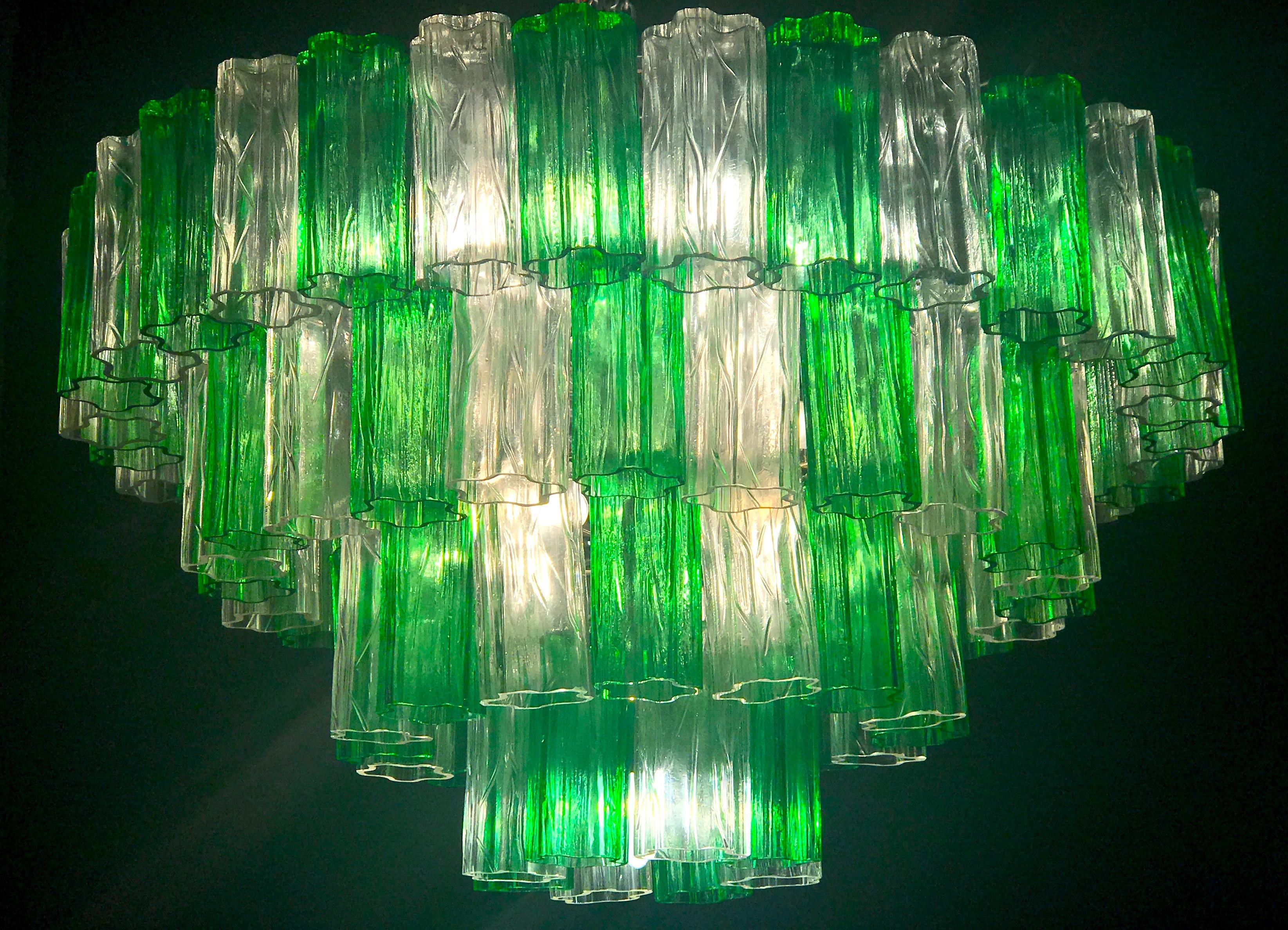 This outstanding chandelier with rare color combination considering the uniqueness with Emerald and ice color precious murano glasses. Each chandelier with 80 original glass blown elements supported by a chrome frame.
12 E 14 light bulbs. Excellent