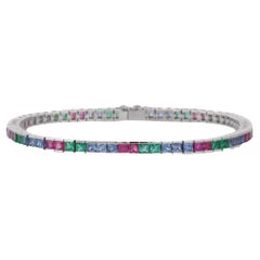 Bracelet tennis en or blanc massif 18 carats serti d'émeraudes naturelles, de rubis et de saphirs 