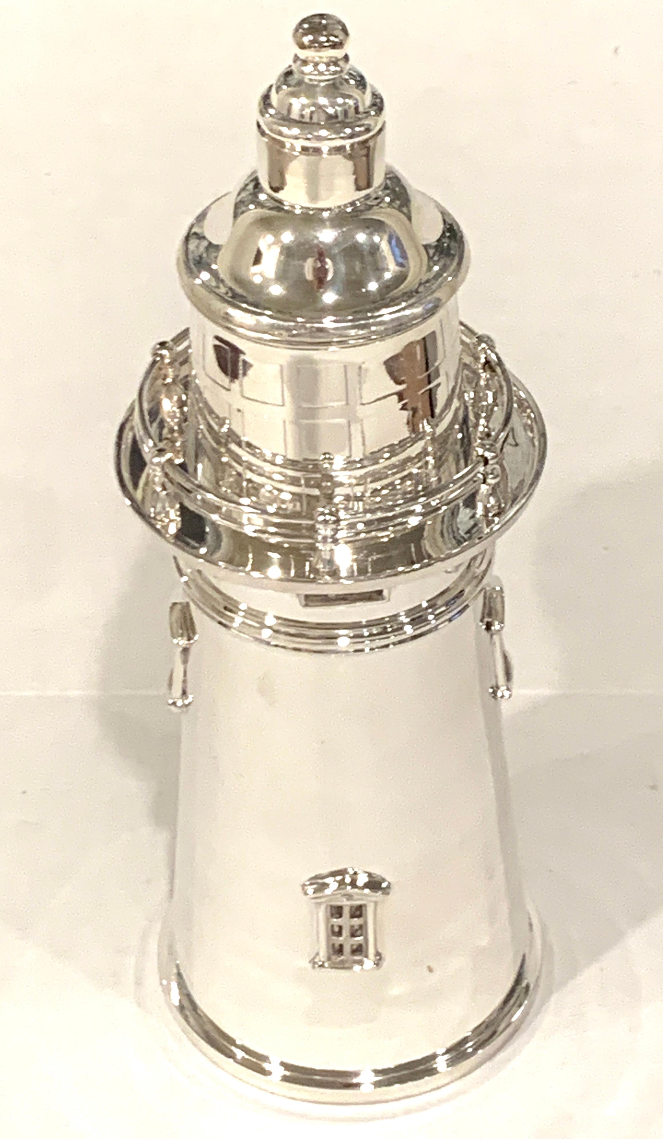 Modern English silver plated lighthouse cocktail shaker, substantial and highly detailed model of a lighthouse cocktail shaker, in three parts. Hallmarked with crown.