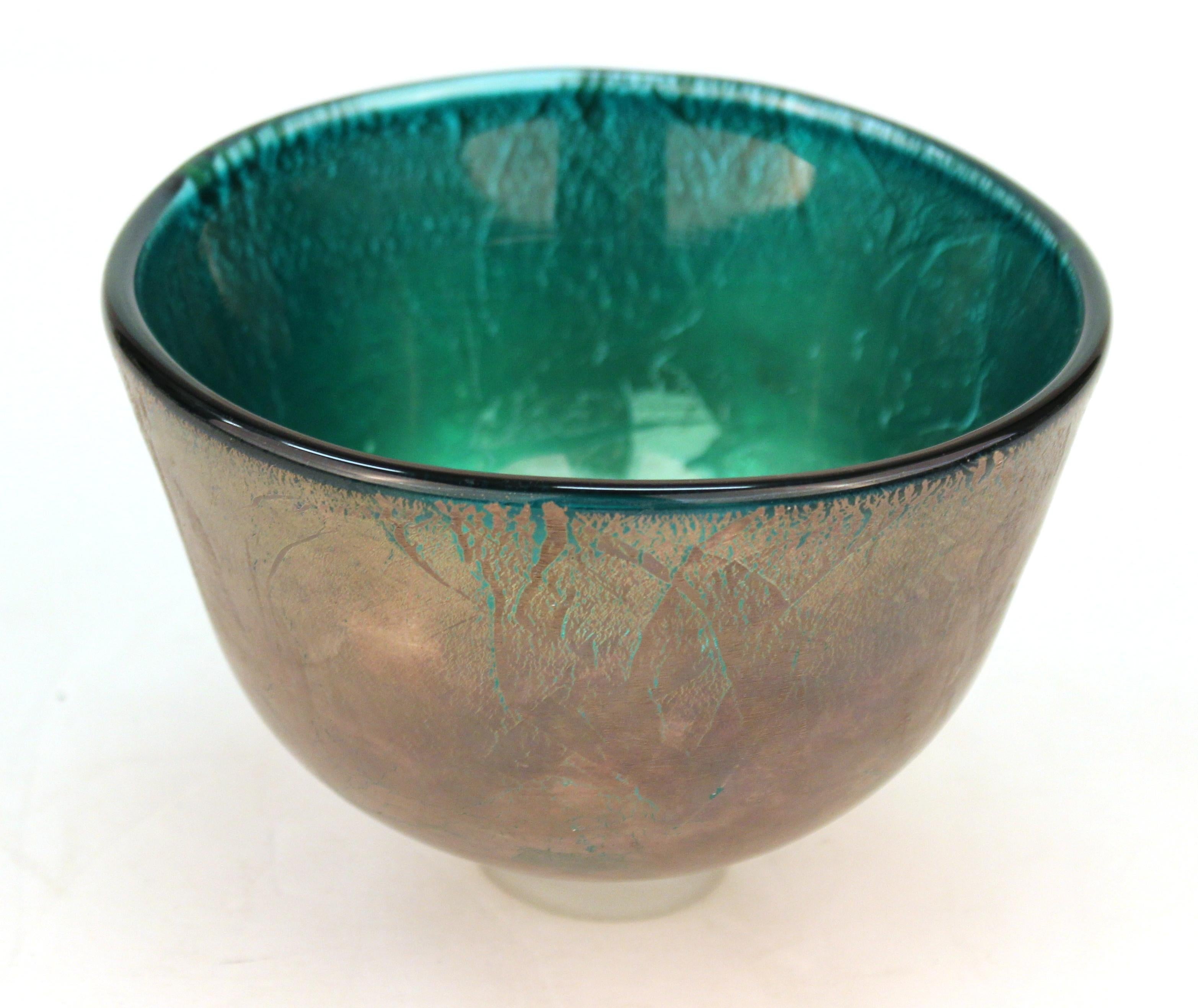 Modern style English studio art glass footed bowl shaped dish. The piece is signed illegibly and inscribed on the bottom of the foot and dated 2000. In good vintage condition with minor age-appropriate wear to the bottom of the foot.
