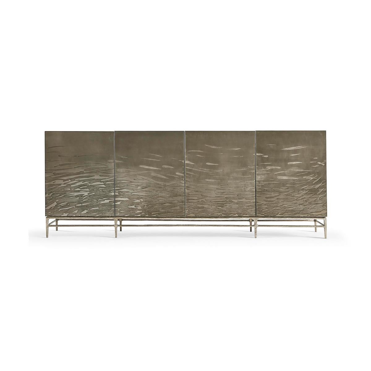 Bleached oak and metal create a stunning cabinet. The modern cabinet with age-old acid etched techniques on steel doors with an abstract flowing water motif in relief. Sitting atop delicate natural flared metal legs with a stretcher.

The interior