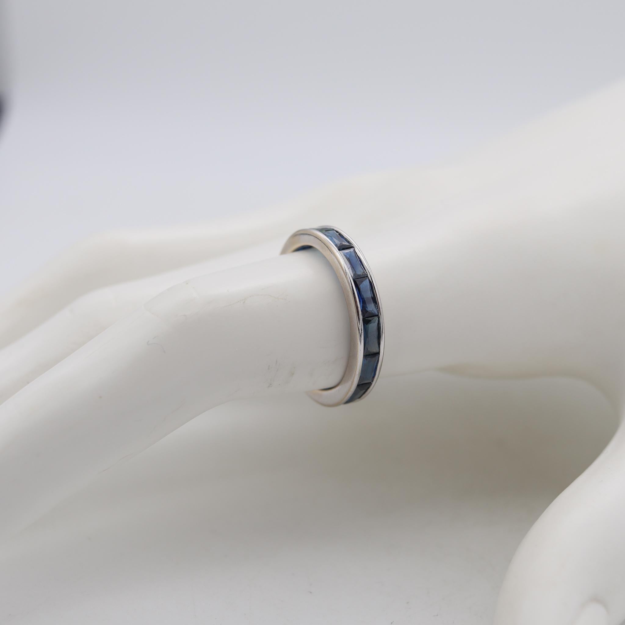 Women's or Men's Modern Eternity Band 18Kt White Gold with 3.03 Ctw French Baguette Cut Sapphires For Sale