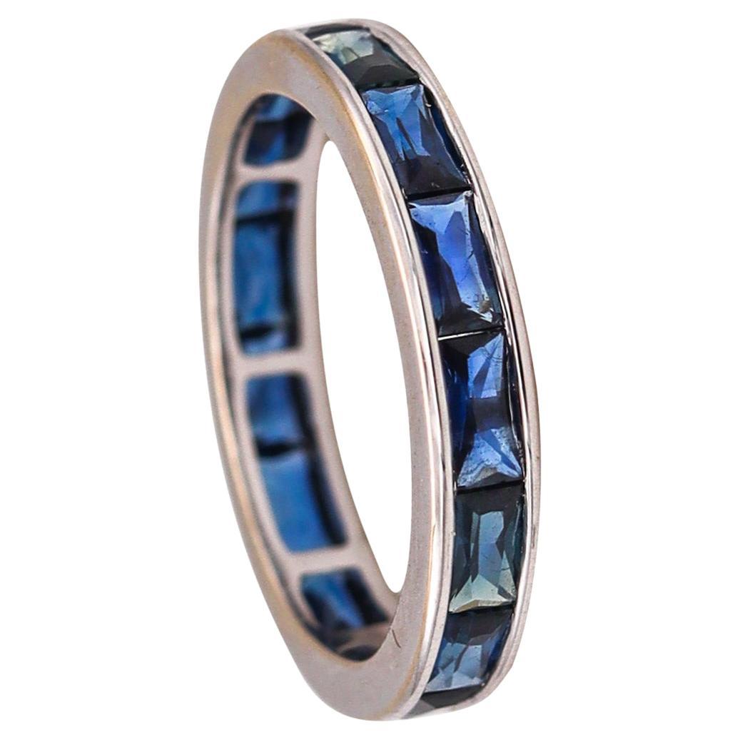 Modern Eternity Band 18Kt White Gold with 3.03 Ctw French Baguette Cut Sapphires For Sale