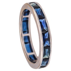 Modern Eternity Band 18Kt White Gold with 3.03 Ctw French Baguette Cut Sapphires