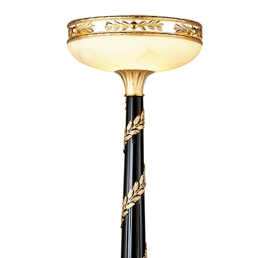 Bring the nostalgic Grand Tour style and Bridgerton Design into your home with this floor lamp torchere of Empire revival design . This contemporary work is entirely hand-made in Spain, with high-quality materials, the black lacquered wood structure