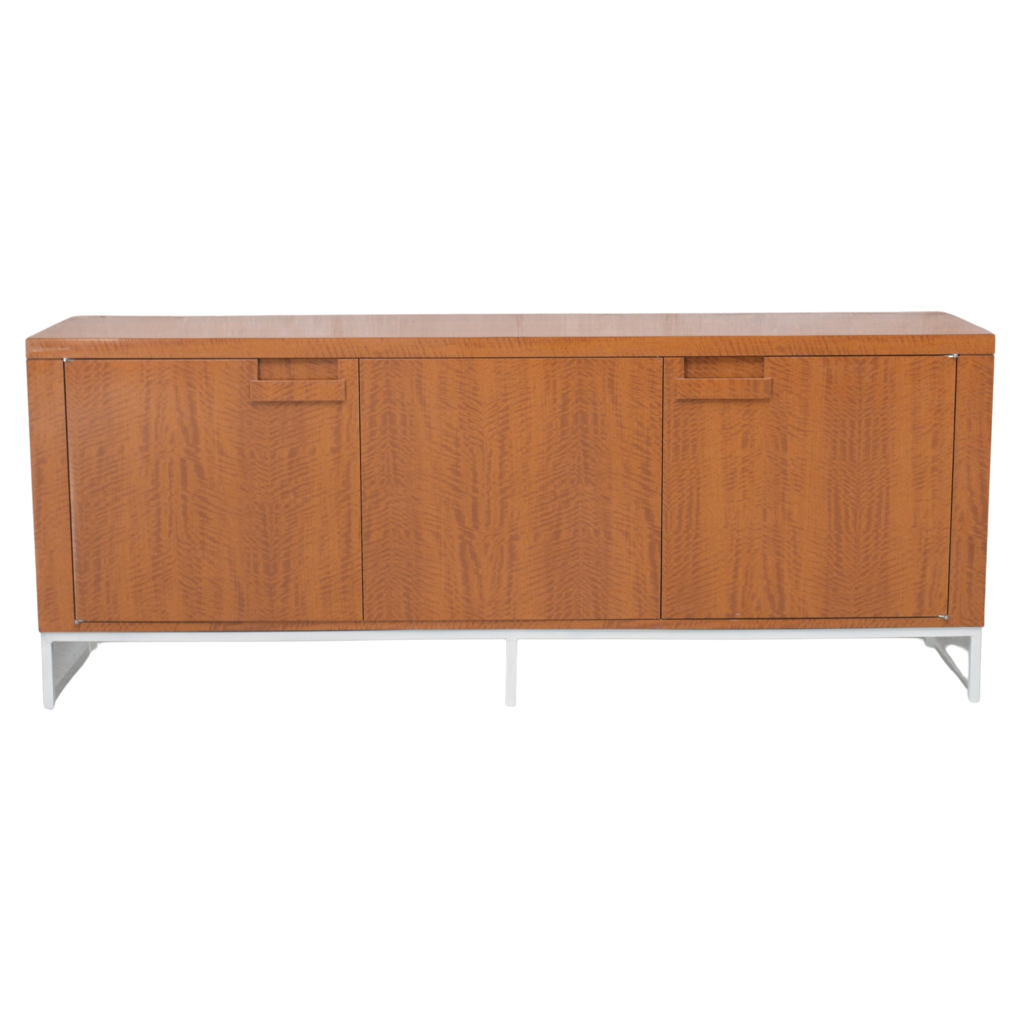 Transform your workspace into a haven of style and efficiency with our modern executive credenza. Meticulously restored to its original glory by our in-house team of expert craftsmen, this vintage piece melds functionality with impeccable design.