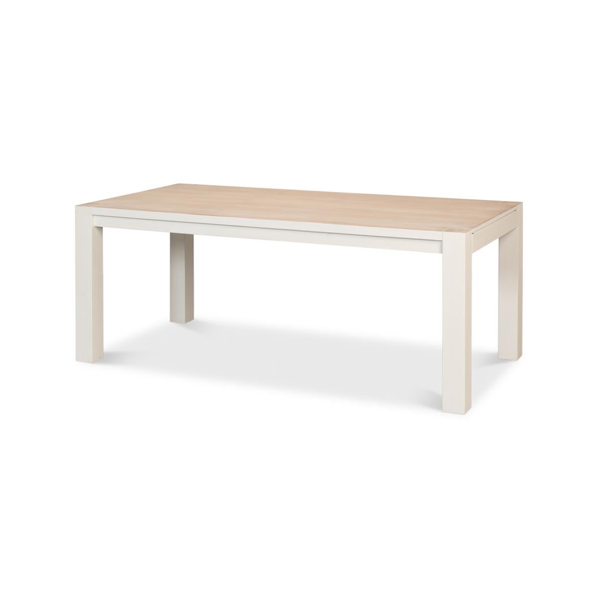 Modern extension dining table, constructed of historic reclaimed pine which has been reformatted into its contemporary expression as a highly functional extension dining table, a perfect balance between old and new. With self-storing leaves, the