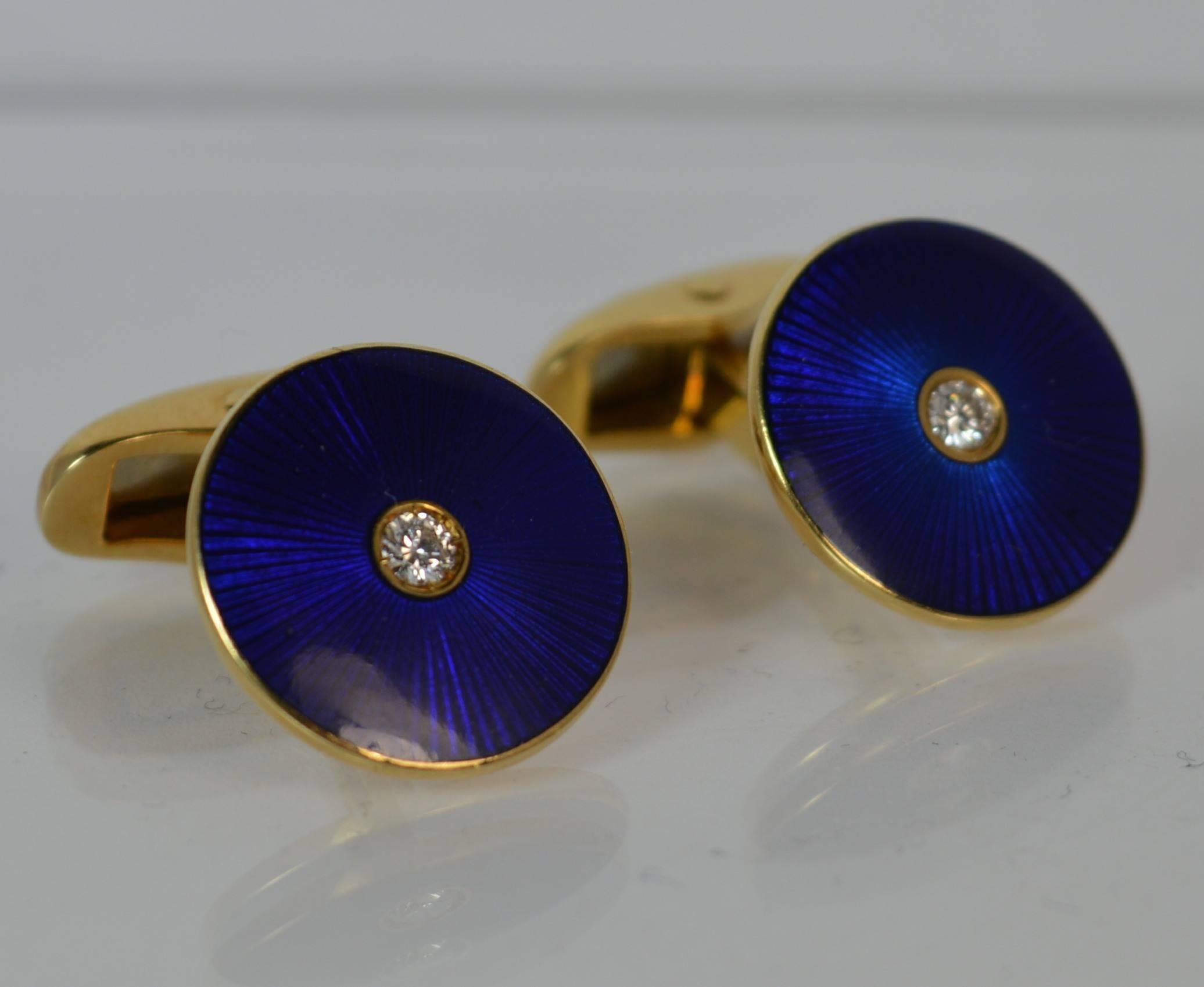 
A stunning quality 18ct Gold, Guilloche Enamel and Diamond cufflinks by the famous Faberge.


​Stylish shape and design. Circular shape with a VVS round brilliant cut diamond to the centre and deep Royal blue enamel surrounding.


Full hallmarks
