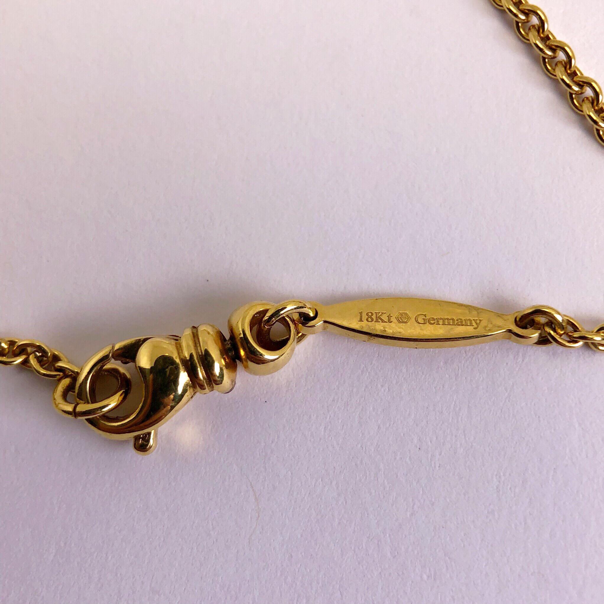 Fabergé, collier moderne en forme d'œuf cascade en or jaune 18 carats, émail et diamants Unisexe en vente