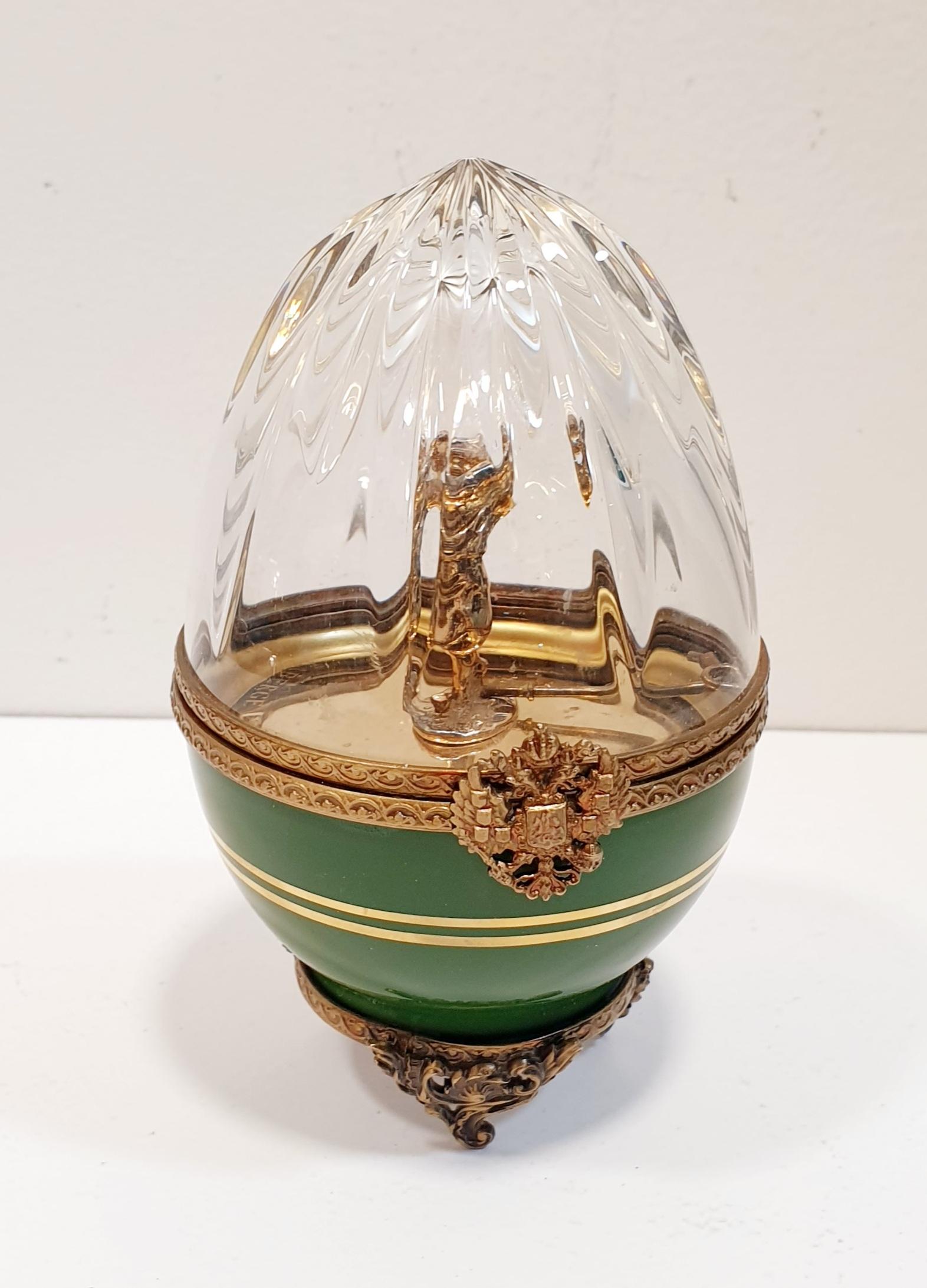 The Fabergé egg is the symbol of spiritual and physical rebirth and renewal. 
This crystal egg is signed and numbered 281
Fabergé eggs are handcrafted in St. Petersburg. Russia.
As descendants of the original Fabergé artists, they recreated the eggs