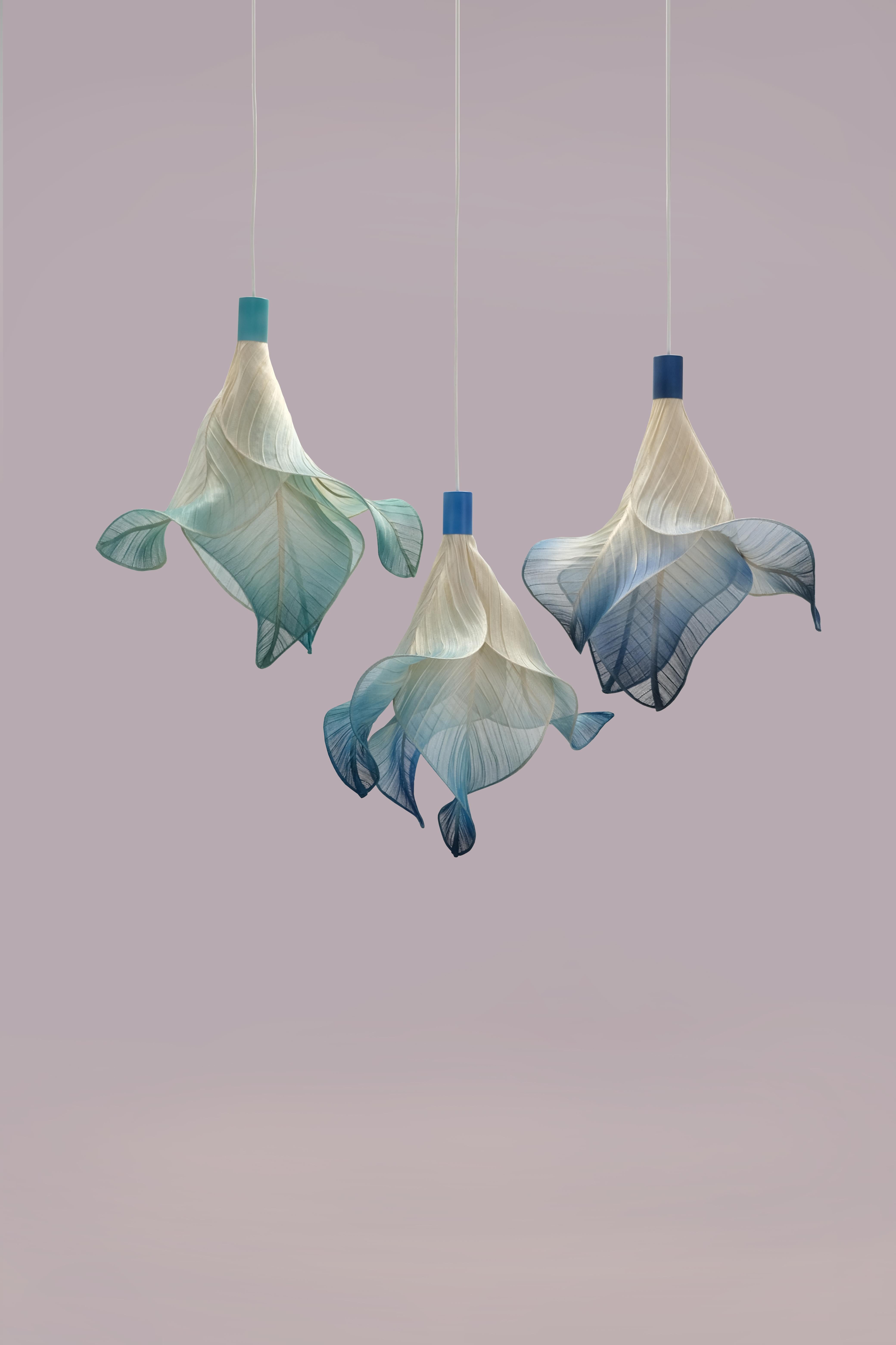 Sirenetta Modern Fabric Pendant Hand-Painted Light from Studio Mirei, represented by Costantini Design

Sirenetta; inspired by a sea siren. 

When the sun hits the horizon, imagine it gracefully swimming to the water surface to catch a glimpse of
