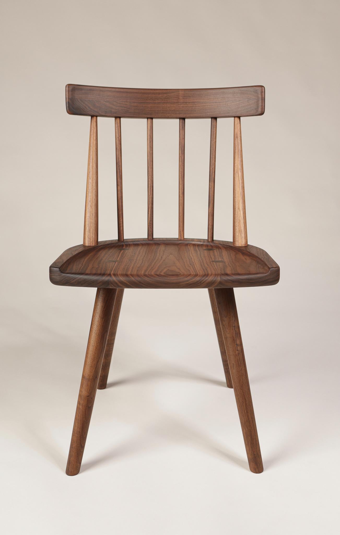 A contemporary take on the classic Windsor chair.  Hand-turned spindles feature wedged, mortice and tenon joinery for strength and aesthetic appeal, an heirloom-quality piece. 

Chairs are built to order, bespoke options always available. Wood