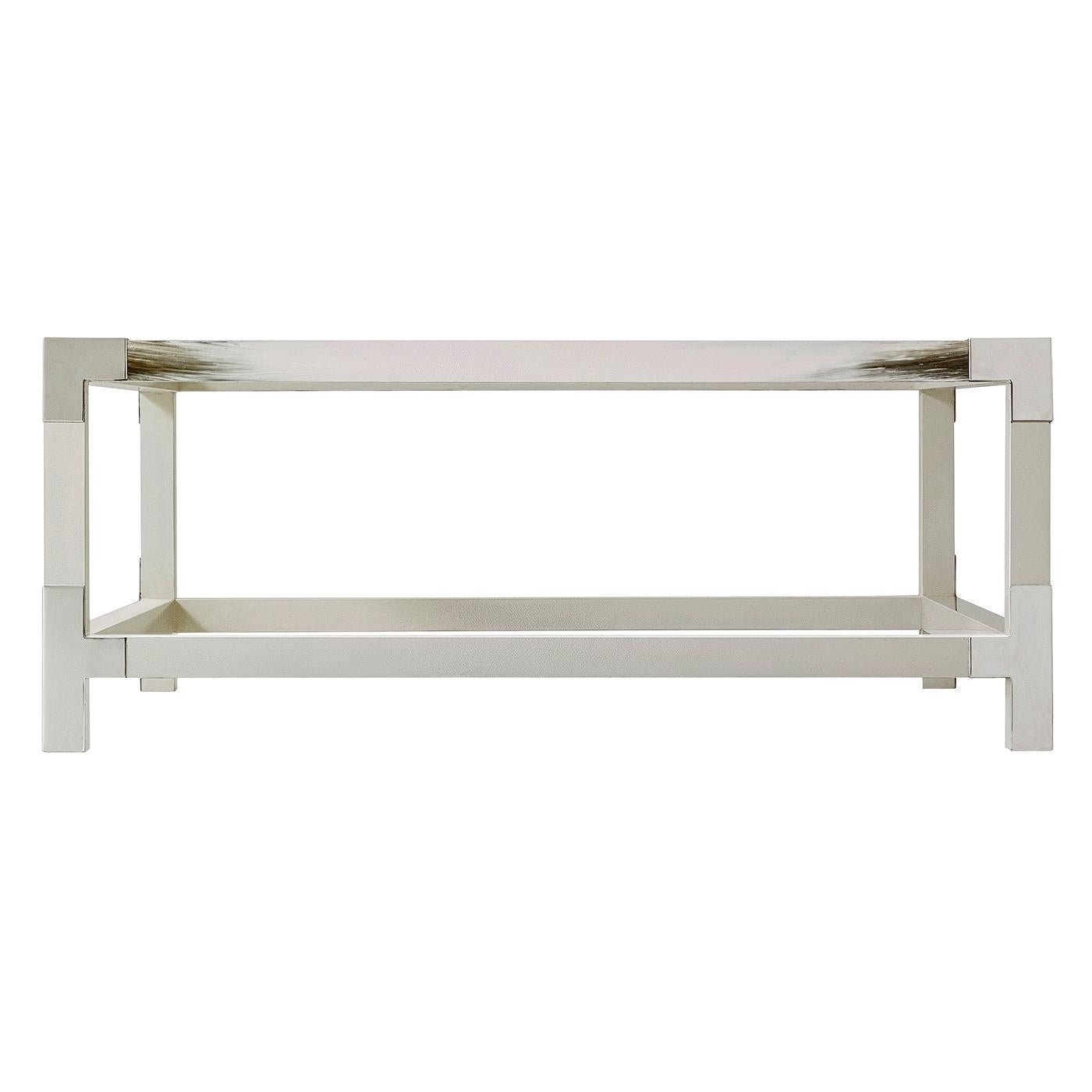 Modern hand painted faux Horn wooden frame coffee table with stainless steel edge corners and tempered glass inset top and lower shelf.
Dimensions: 44