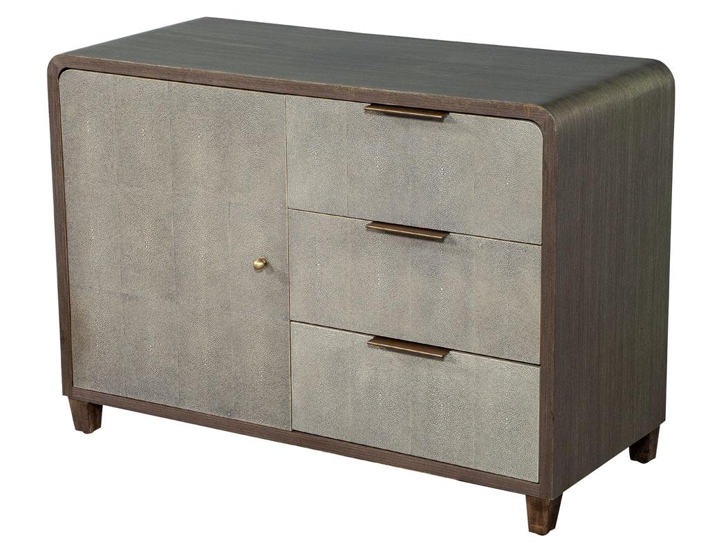 Modern faux shagreen cabinet dry bar. Classic faux shagreen fronts with a silver glazed case. Finished with bronze hardware.
