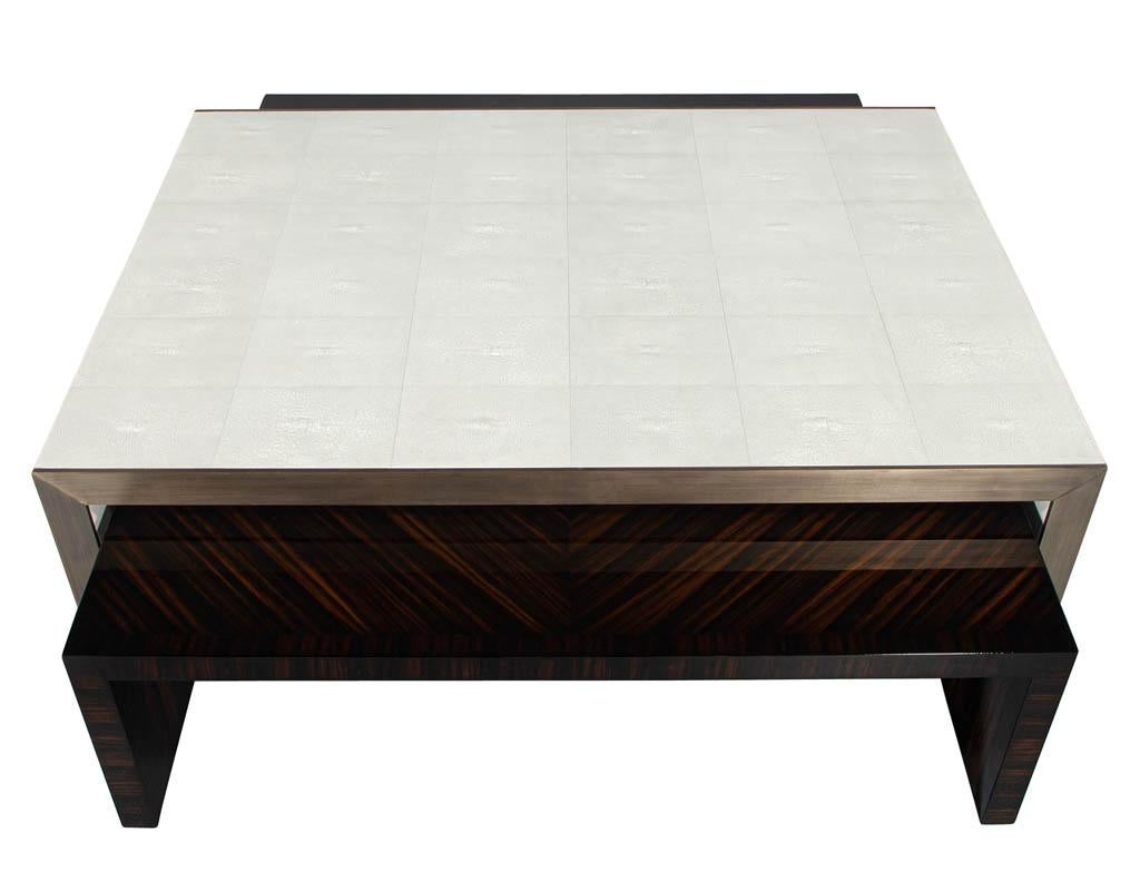 Modern Faux Shagreen Coffee Table with Macassar Nesting Tables. This Carrocel custom creation is stunning. Featuring a textured faux shagreen top framed in hand applied stainless steel metal with a champagne plated finish color. Completed with