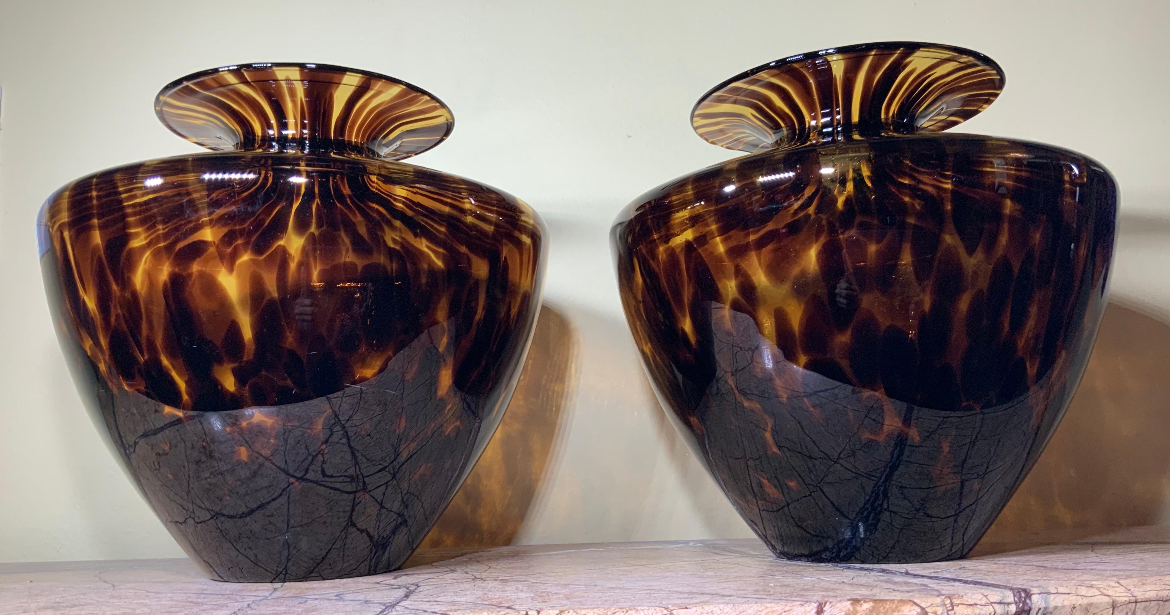 Mid-Century Modern faux tortoiseshell style blown glass vases, The Tartaruga (tortoise) pattern has beautiful deep Topaz and Amber coloring. Great object of art glass for display.

 