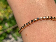 Modern Fine Jewelry Black Diamond Yellow 18 Karat Gold Tennis Bracelet