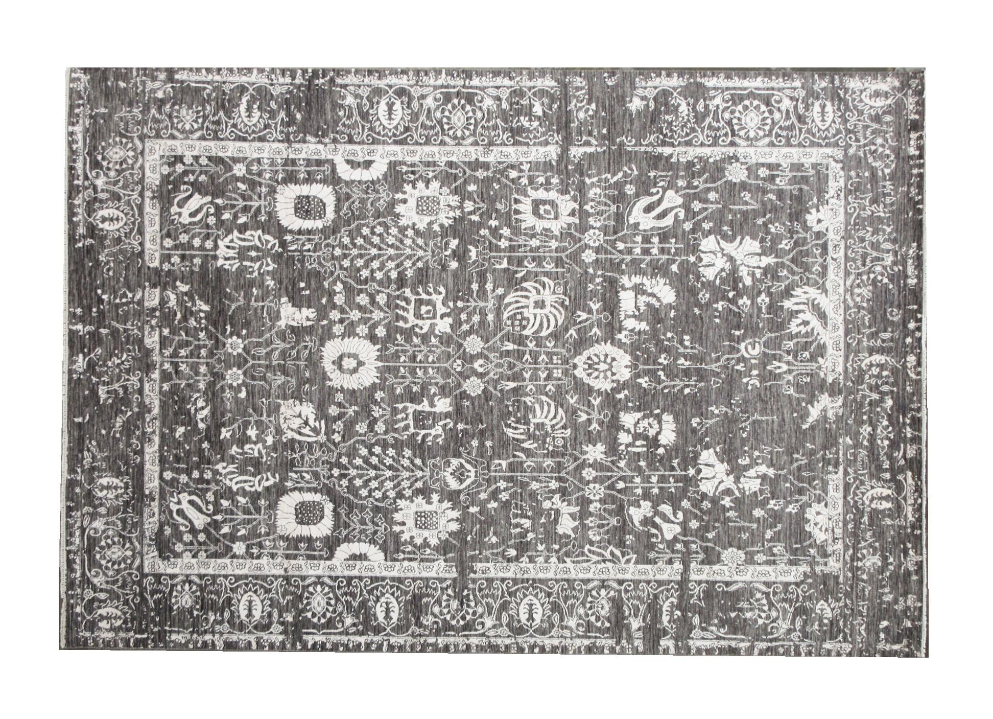 Hand-knotted wool & silk pile on a cotton foundation.

Dimensions: 10' x 14'

Origin: India

Field Color: Charcoal

Border Color: Charcoal

Accent Colors: Silver.