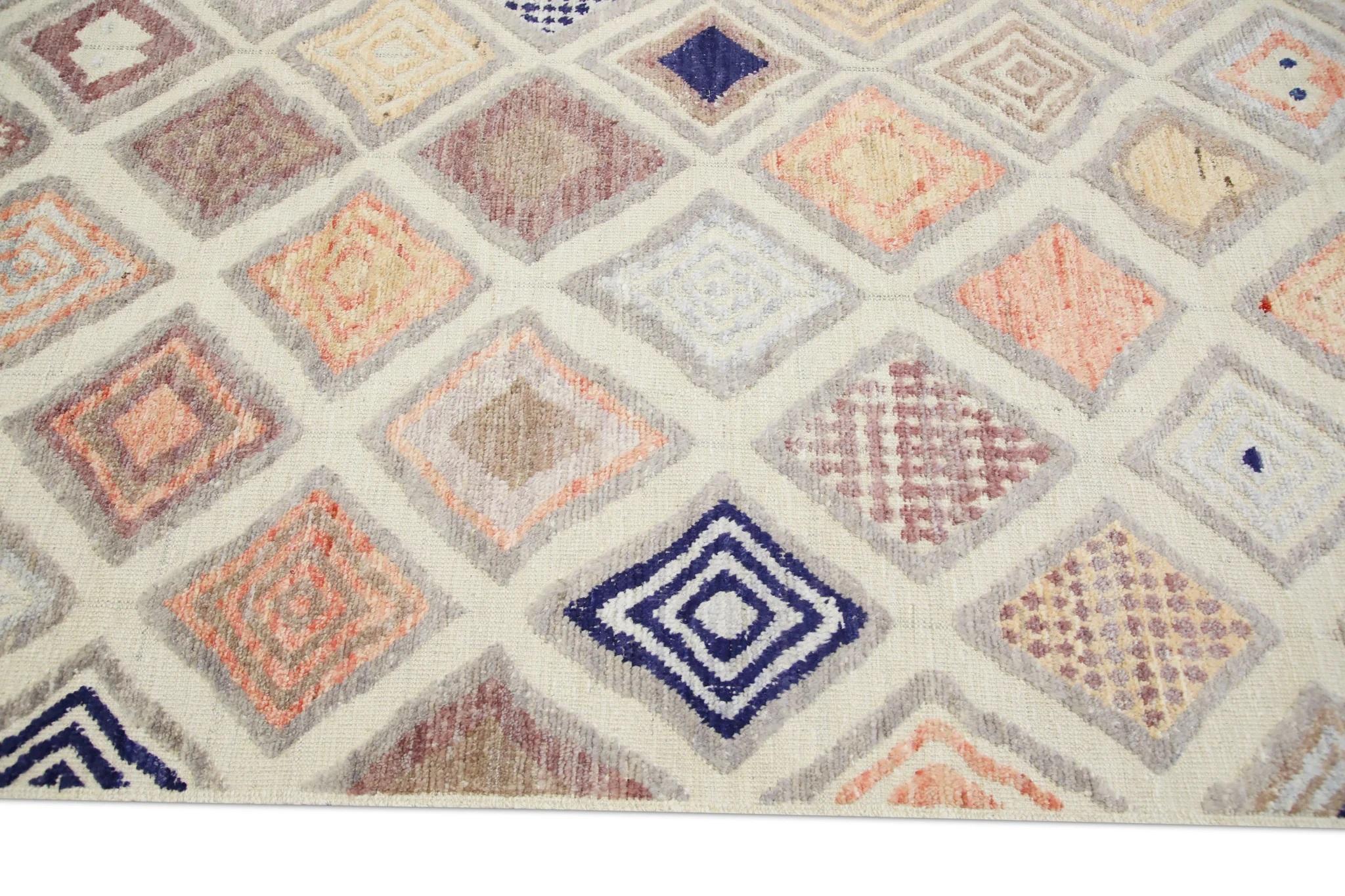 Handgefertigter Flachgewebe-Wollteppich in Rosa & Blau mit geometrischem Muster 8'2