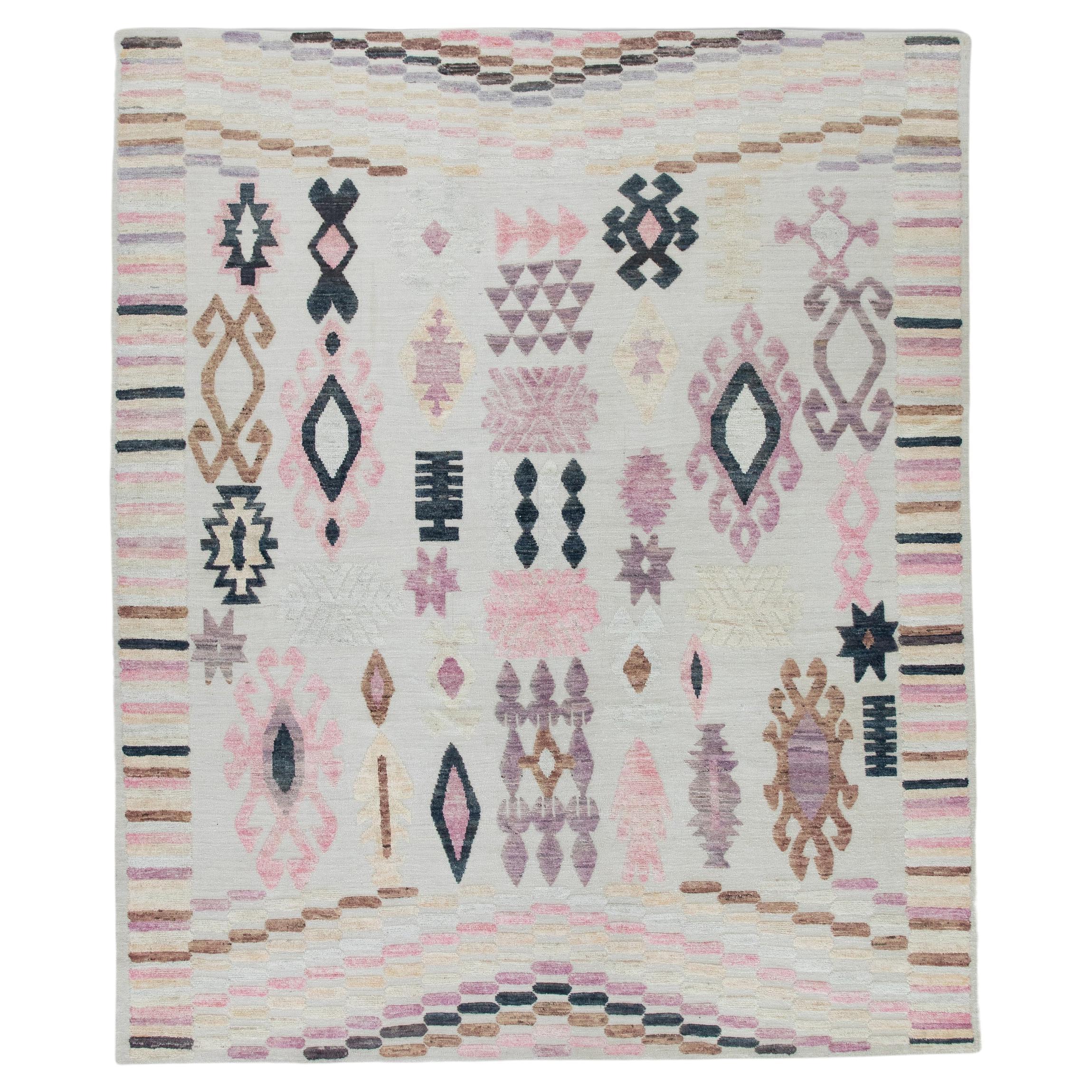 Tapis en laine tissé à la main à motifs géométriques roses, violets et bruns 9'11" X 11'10".