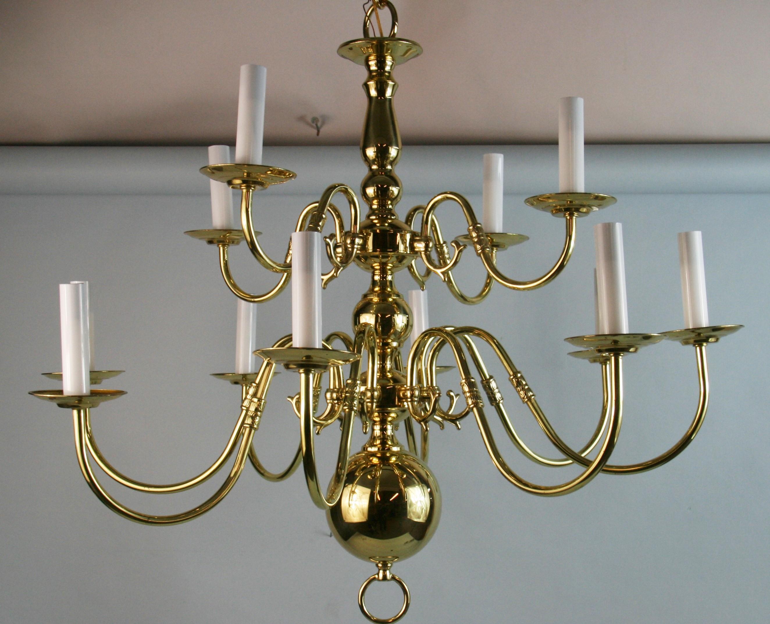 1561  Solid polished brass 12 light Flemish style chandelier
Supplied with 36