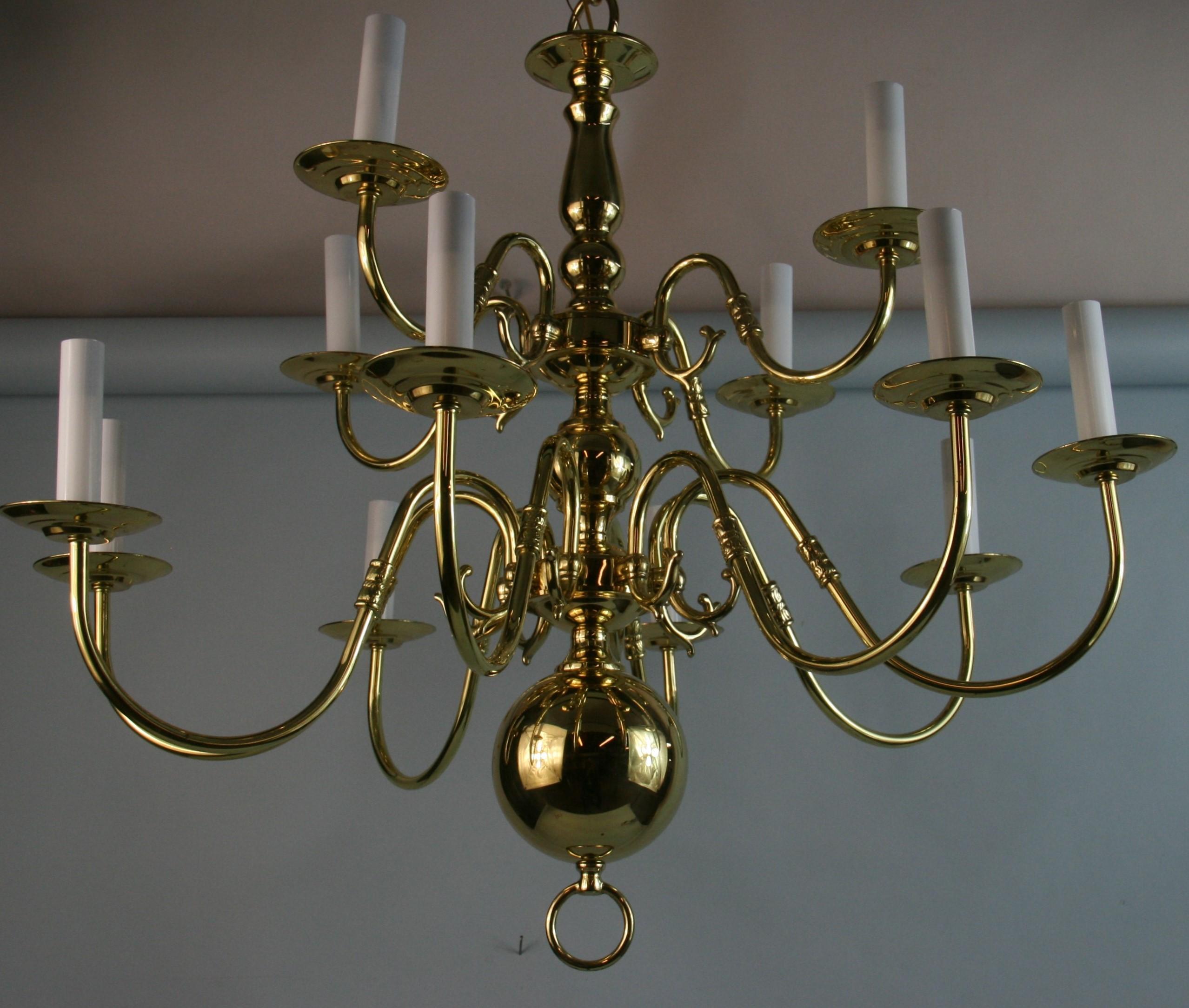 Modern Flemish Style 12 Light Brass Chandelier In Good Condition For Sale In Douglas Manor, NY