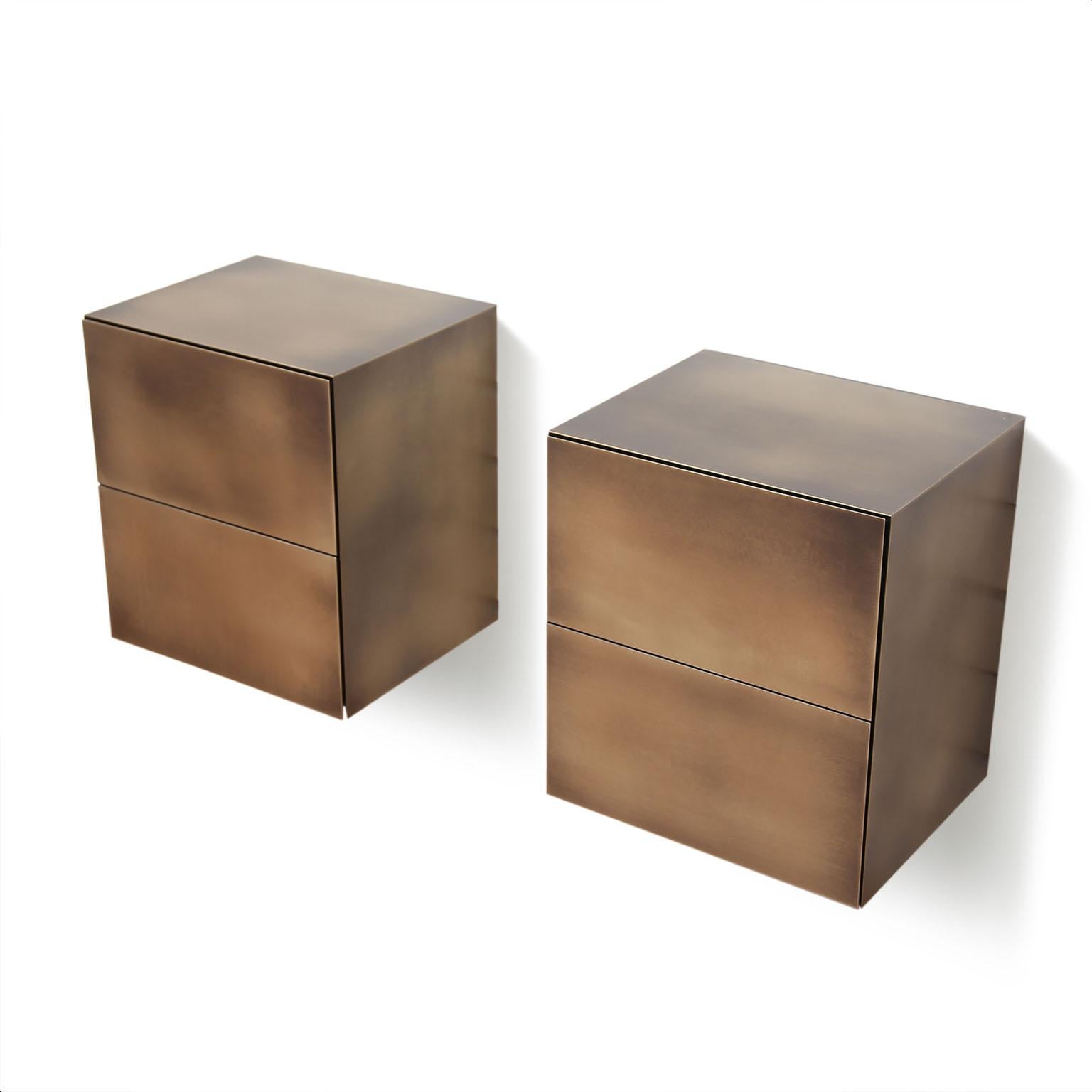 Exquisite Set of 2 nightstands, a masterpiece crafted from engineered wood and adorned with a polished, slightly brushed, burnished, varnished brass finish. These exceptional pieces are designed with meticulous attention to detail, featuring each