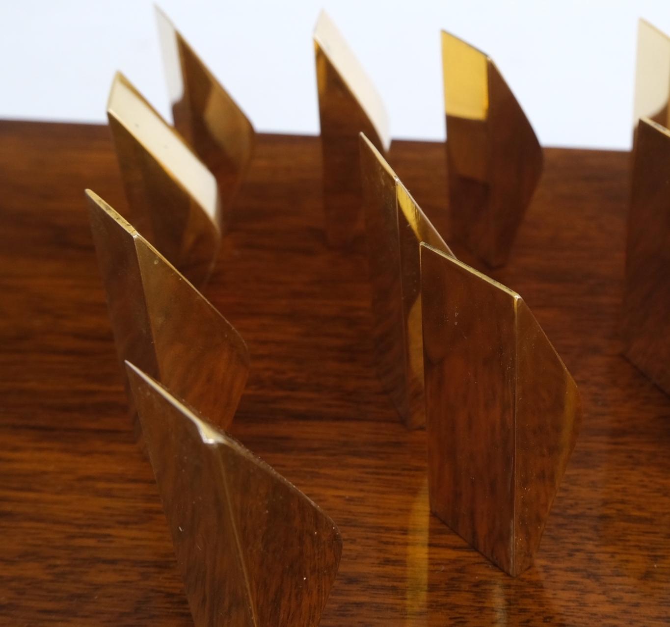 Modern flock of birds sculpture solid brass figurines on rectangle solid walnut block.