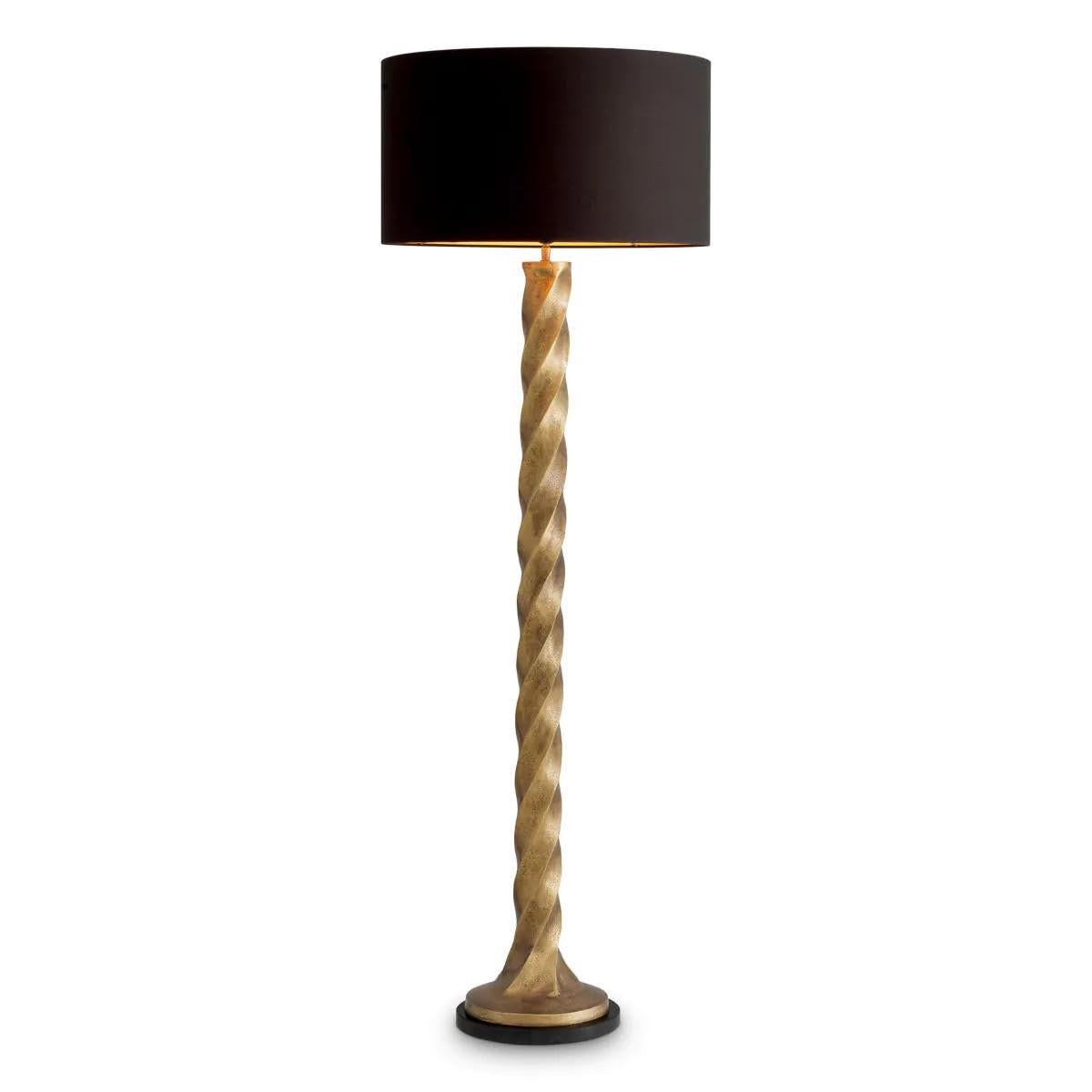 Lampadaire moderne, finition laiton vintage, base en granit noir.

Découvrez ce lampadaire, conçu pour ajouter une touche d'élégance et d'ambiance à n'importe quelle pièce.
Ce lampadaire intemporel est doté d'une magnifique base en granit noir, un