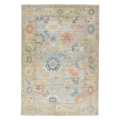 Moderner handgefertigter Sultanabad-Wollteppich mit Blumenmuster und blauem Feld