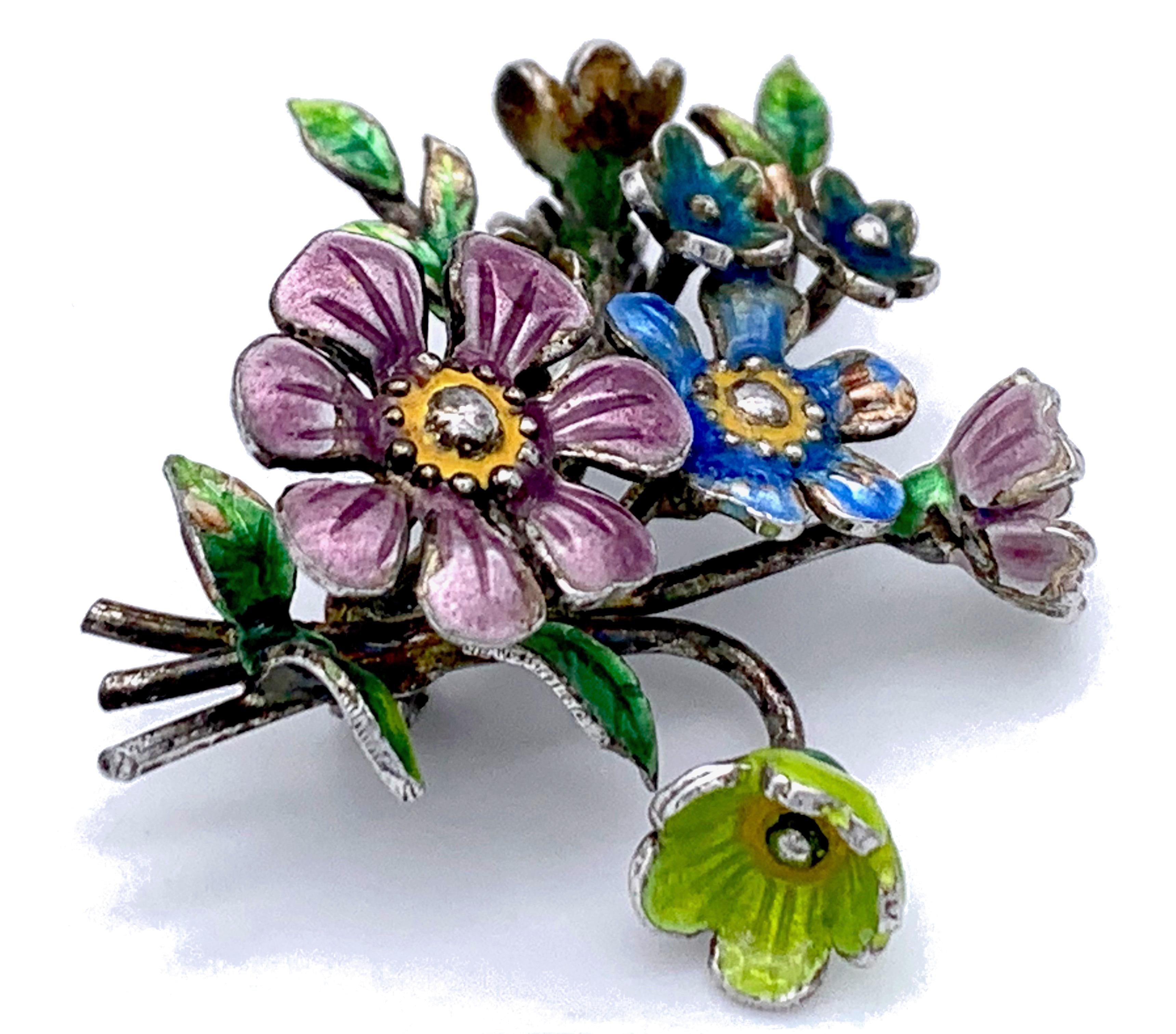 This delicate, beautiflul and colourful brooch in the shape of a flower bouquet will add spring feelings to any outfit.  Contemporary work by Munich master goldsmith Günther Hahn.