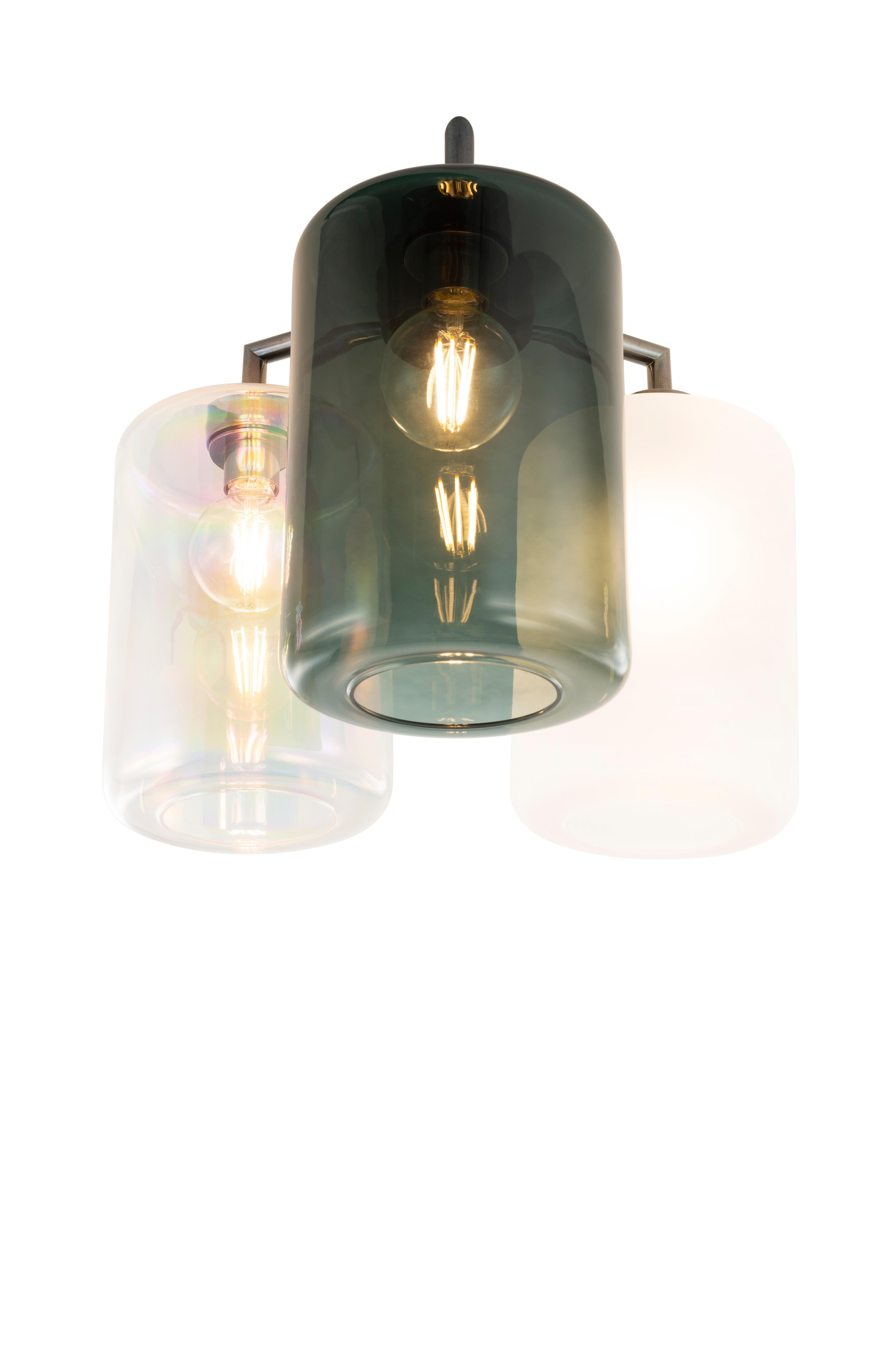 The Louise is a modern flush mount in a brass burnished finish.

With almost carefree delight, William Brand designed the Louise collection. A simple frame, decorated in a pleasing rhythm with glass lanterns. A hint of chaos, never far away in