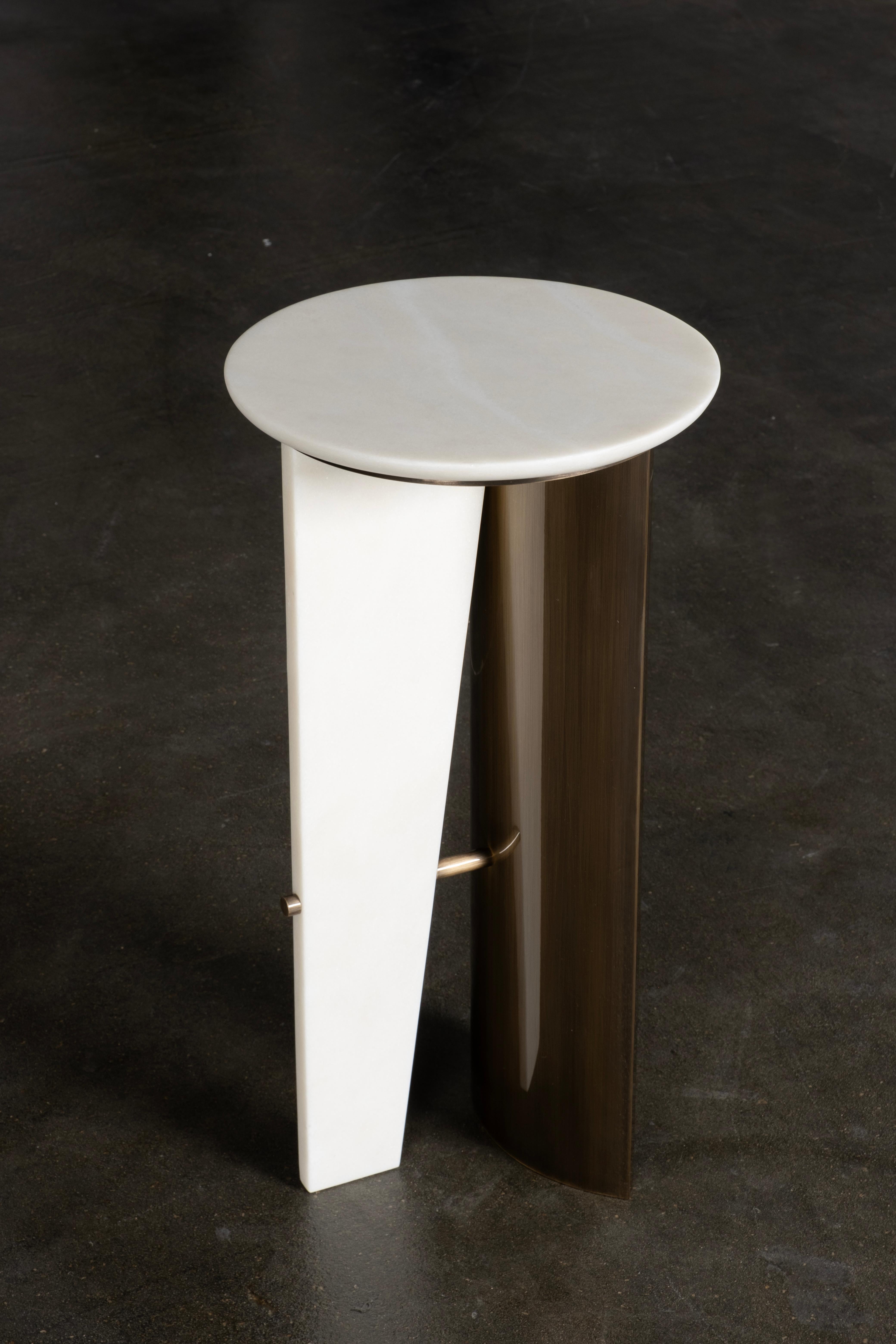 Foice Side Table, Contemporary Collection, Handcrafted in Portugal - Europe by Greenapple.

The Foice marble side table seamlessly combines the echoes of the Neolithic age with contemporary design. Crafted from Calacatta Bianco marble, the table’s