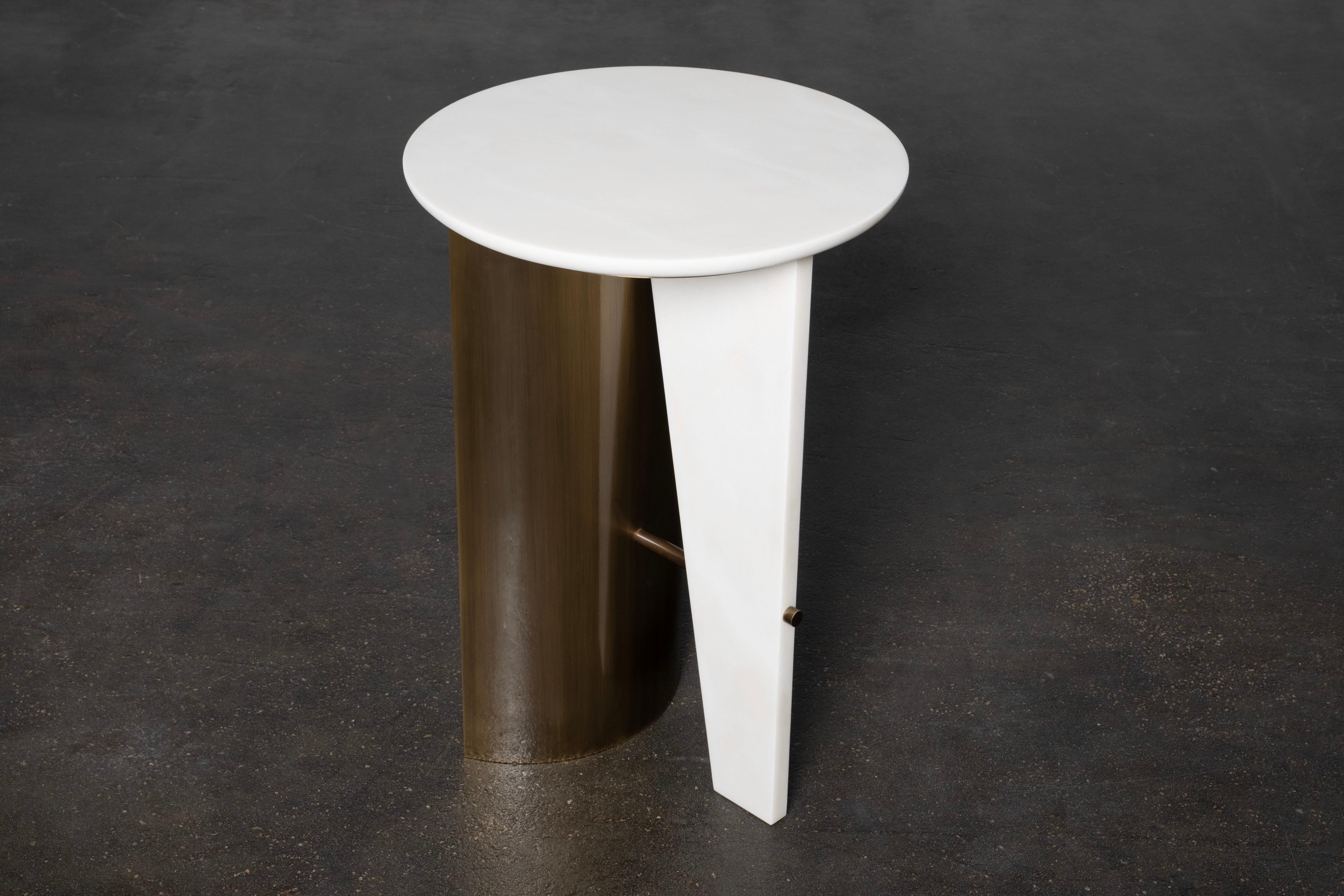 Foice Side Table, Contemporary Collection, Handcrafted in Portugal - Europe by Greenapple.

The Foice marble side table seamlessly combines the echoes of the Neolithic age with contemporary design. Crafted from Calacatta Bianco marble, the table’s