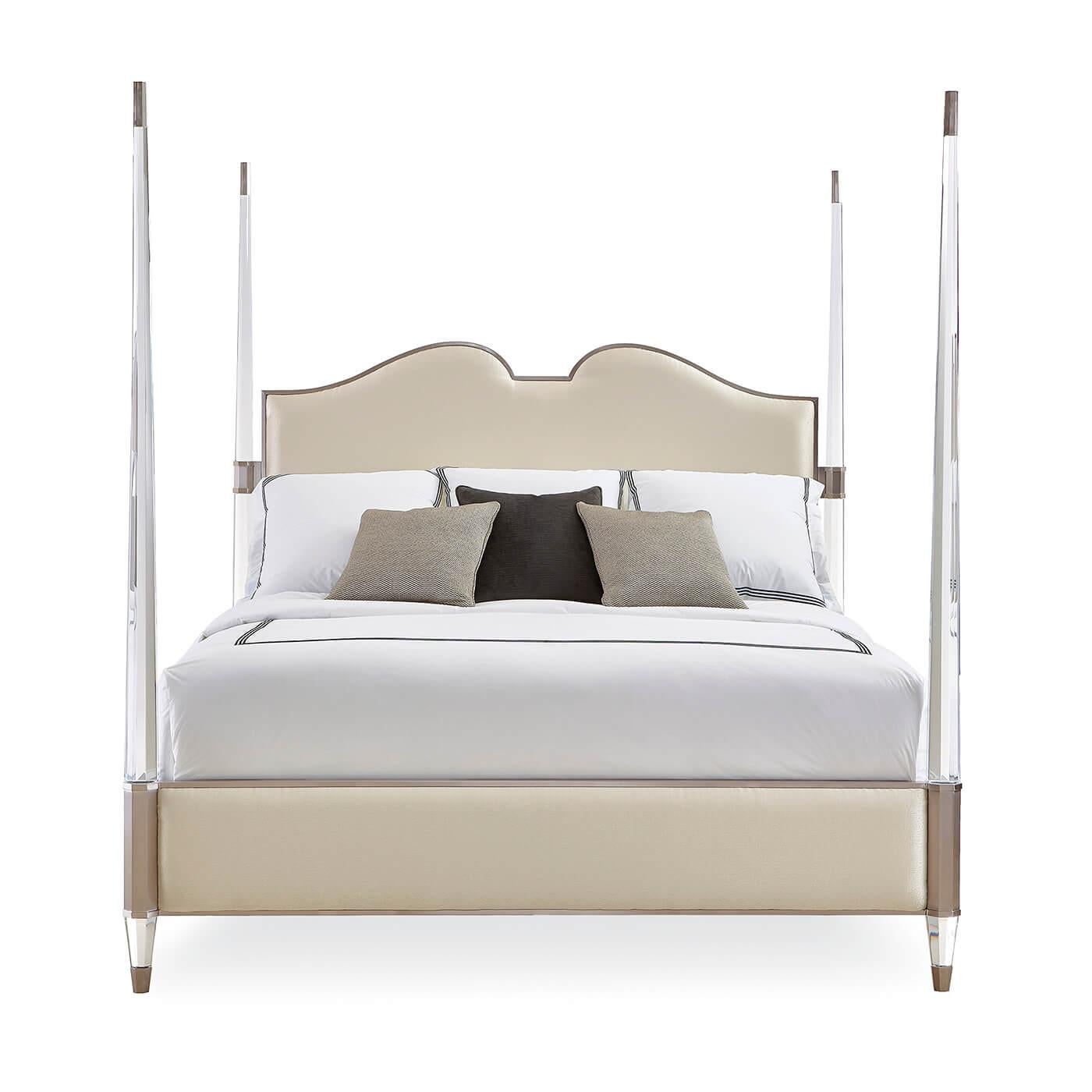 A modern four post king bed with four lucite posts. This bed has a luxurious upholstered headboard, footboard, and rails. Metal ferrules and a lightly brushed chrome finish add a finishing touch.
Dimensions
81.5