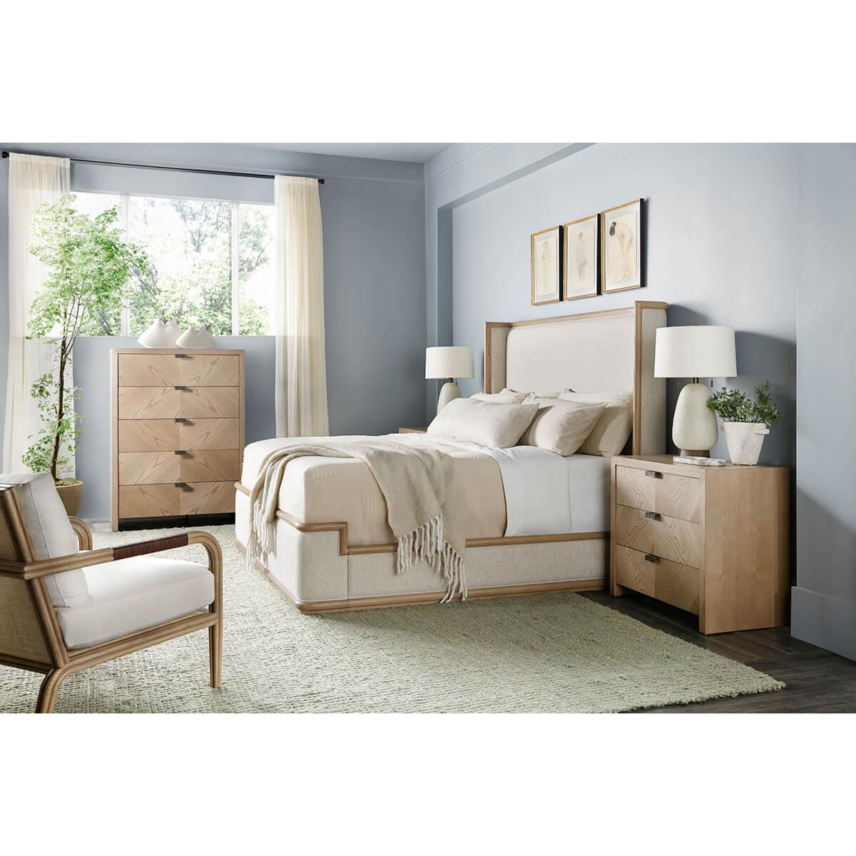 Modern Framed and Upholstered Bed, with a smooth straight grain exposed oak frame trim in our light dune finish. With a high back padded upholstered headboard, upholstered rails and foot board.
California King dimensions: 77.75