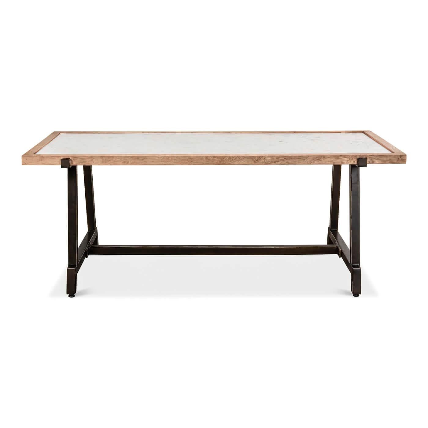A modern framed marble top and metal base coffee table. The large rectangular white marble top is framed in a light stained wood frame. The tabletop rests on a metal base in an antique black finish.

This piece has a modern meets Industrial look