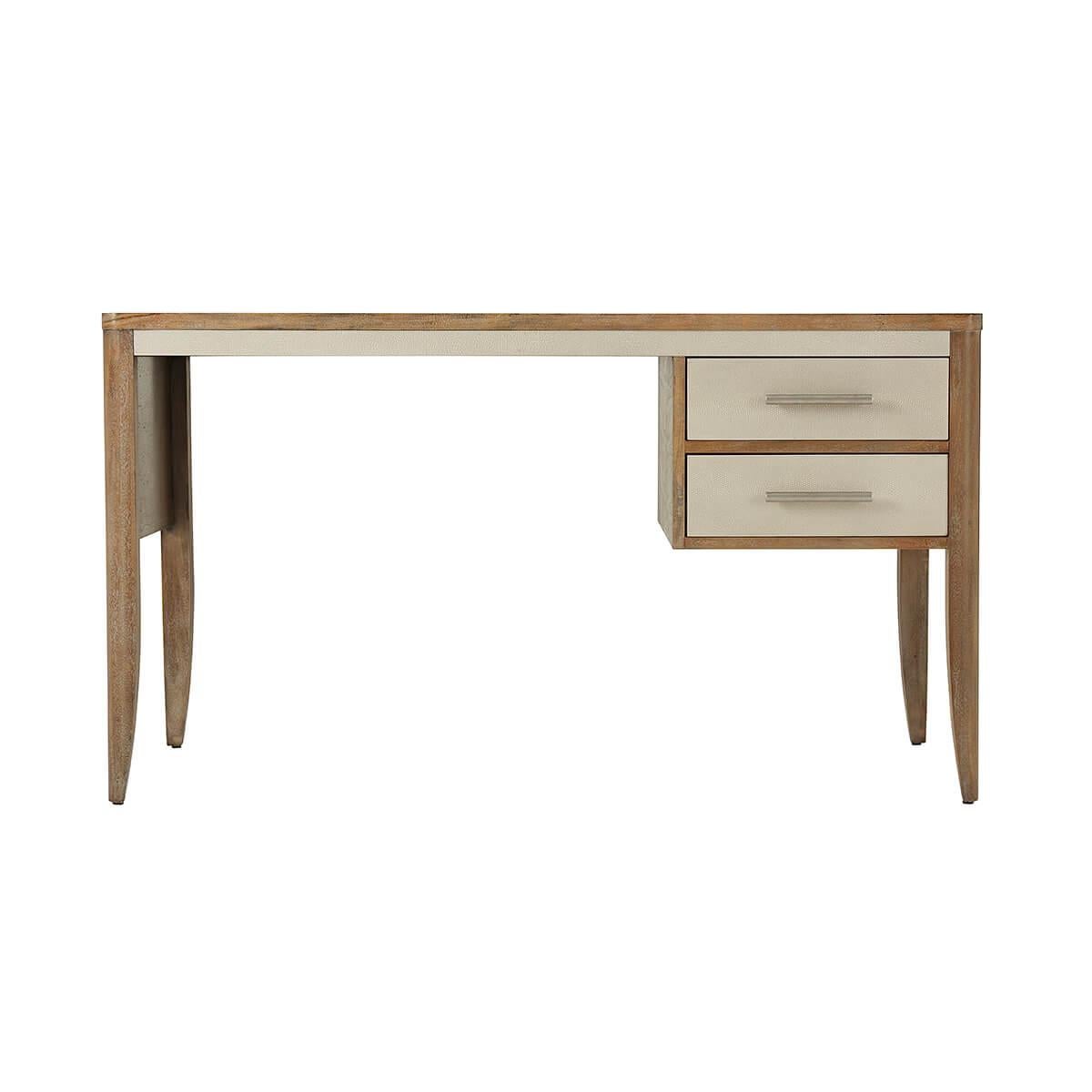 A French two drawer desk with our mangrove beech veneer finish, embossed leather wrapped frieze and drawers with brushed brass finish handles.
Dimensions: 54
