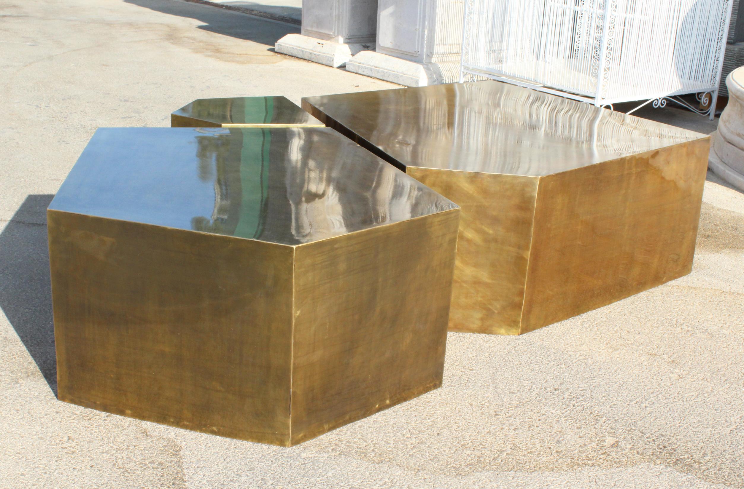 Modern French gilded brass three-piece coffee table.

Measure: Large table 40 x 90 x 97
Medium table 40 x 92 x 79
Small table 40 x 37 x 39.