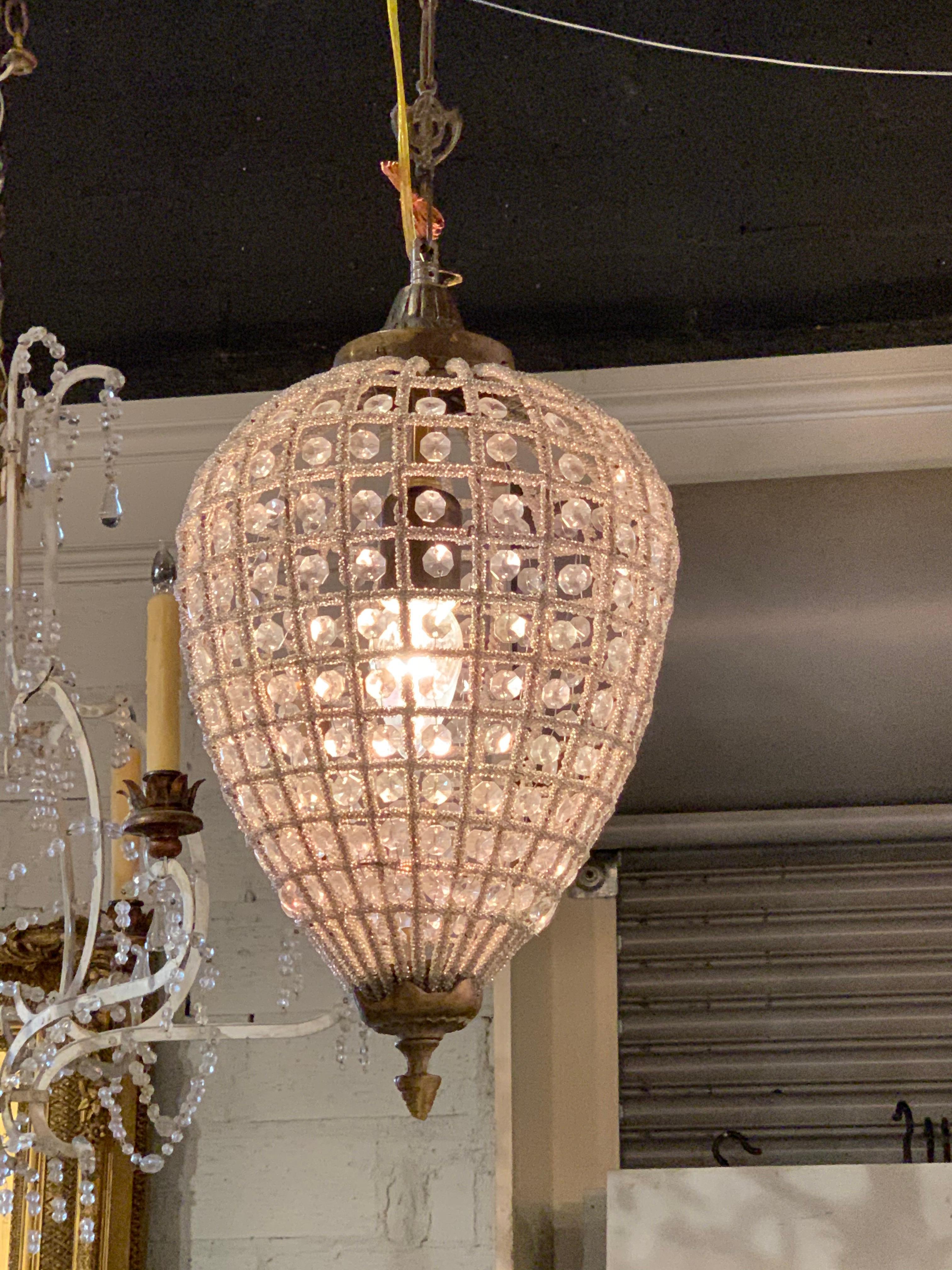 Exquisite modern French style beaded pendant lights. These glisten with an abundance of beautiful beads. There are two available. Price listed is per item.
So pretty!