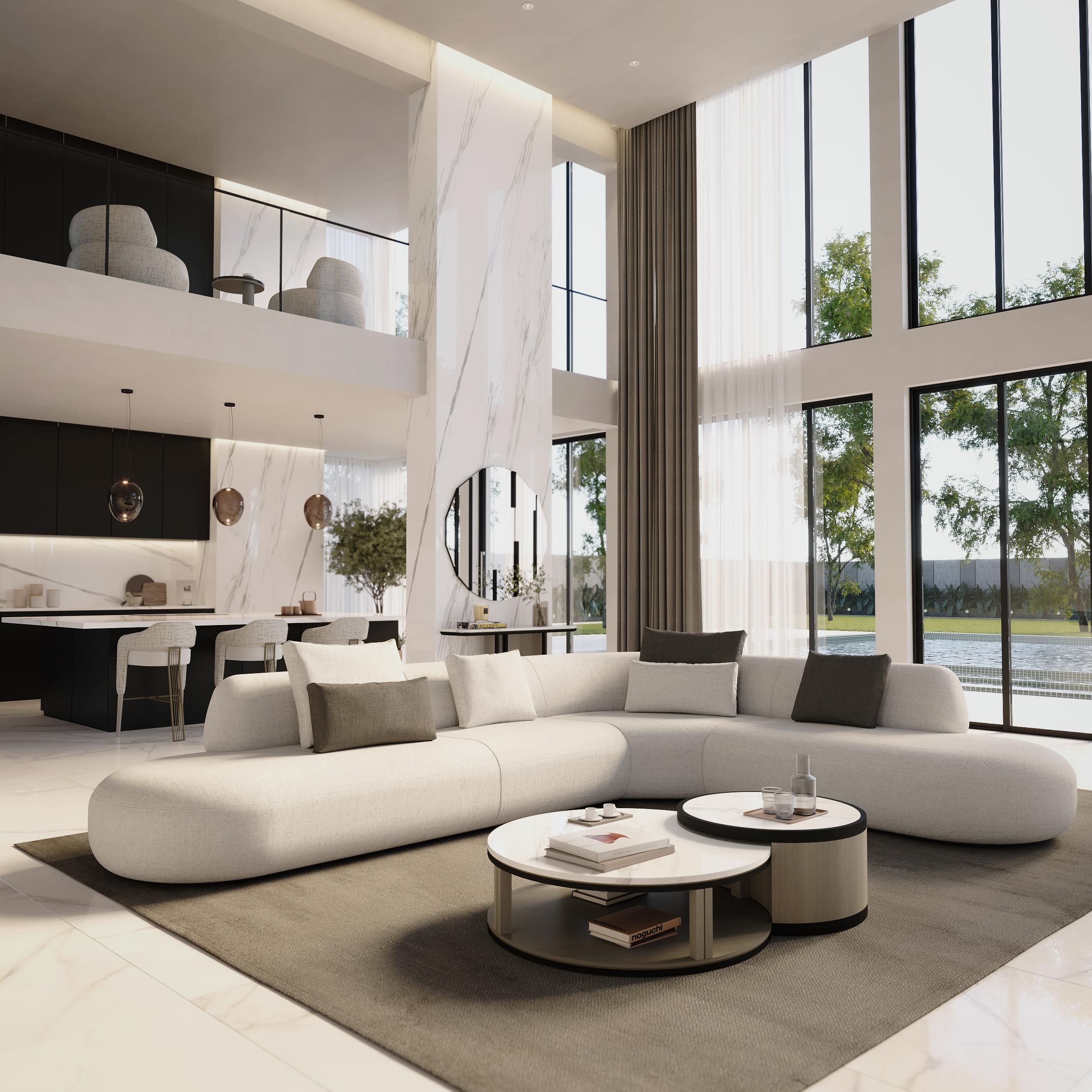 La mesa de centro Fusión presenta un llamativo diseño de dos formas redondas entrelazadas, perfectamente elaboradas como una pieza unificada. Con base de madera y lujosa encimera de mármol, contrasta maravillosamente los materiales naturales con