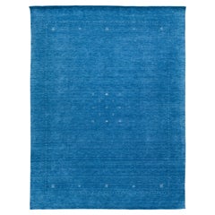 Alfombra moderna de lana estilo Gabbeh, de color sólido azul celeste, confeccionada a mano