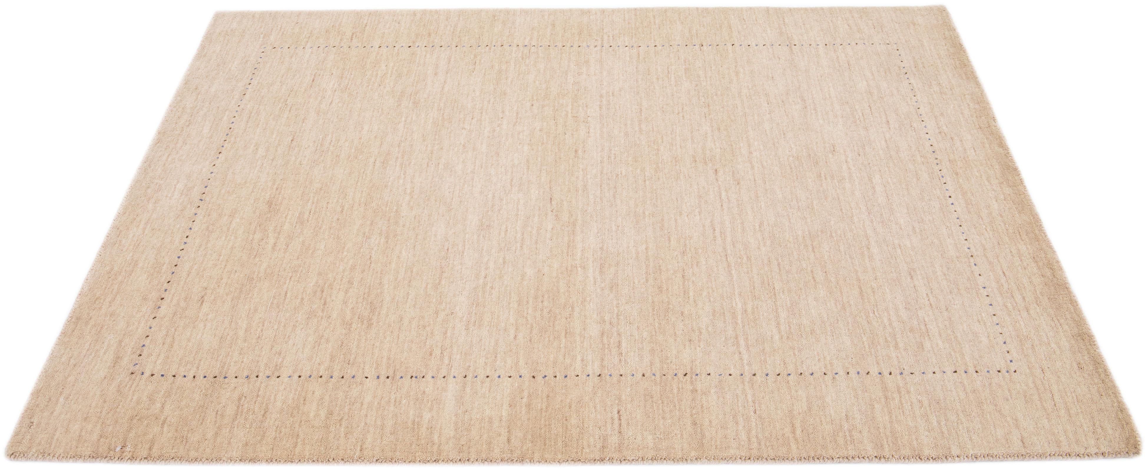 Hand-Knotted Modern Gabbeh Style Handmade Beige Solid Wool Rug For Sale