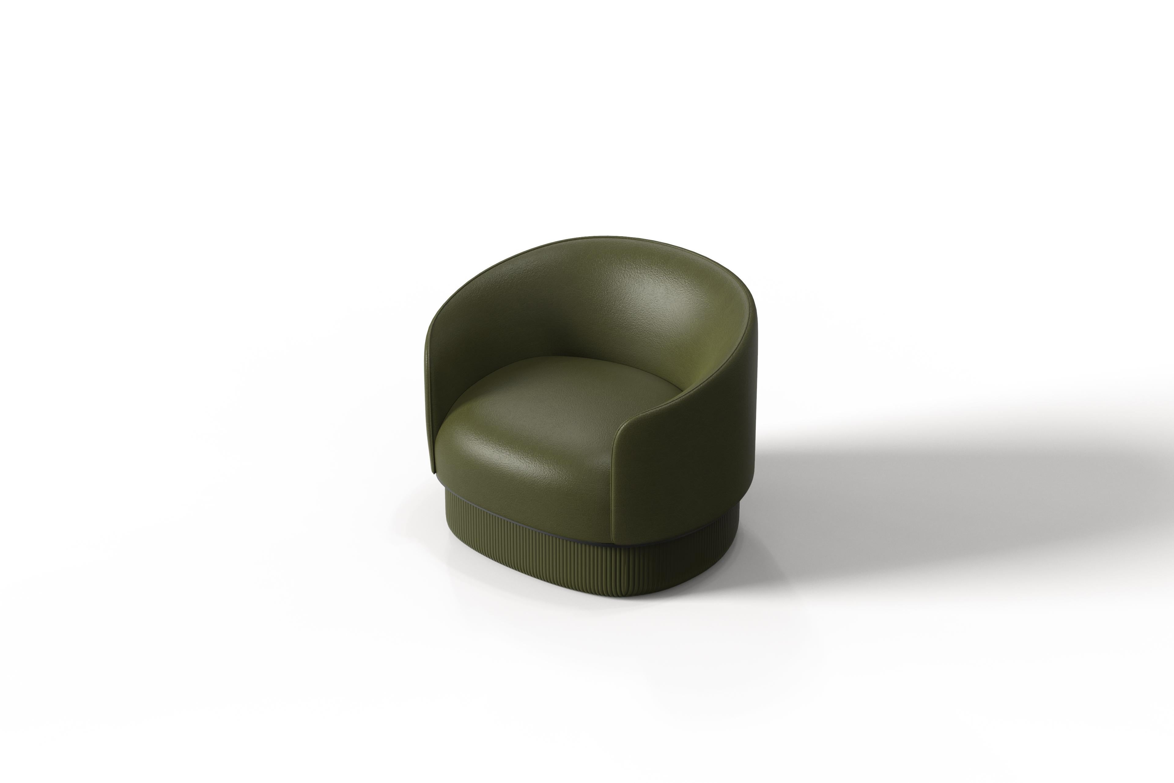 The Modern Gentle Armchair merges luxurious comfort with sophisticated design. Its smooth leather shell contrasts beautifully with a quilted leather base, where vertical stitching creates a rich 3D texture. A sleek metal ring elegantly divides these