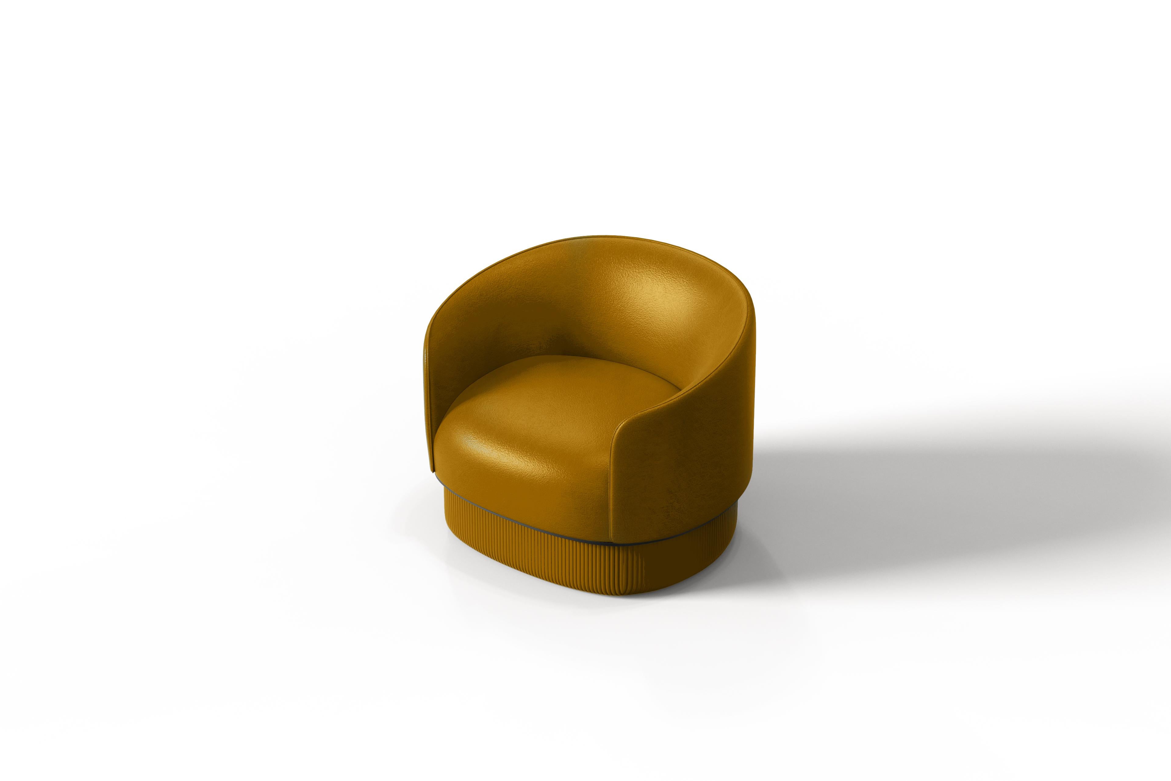 The Modern Gentle Armchair merges luxurious comfort with sophisticated design. Its smooth leather shell contrasts beautifully with a quilted leather base, where vertical stitching creates a rich 3D texture. A sleek metal ring elegantly divides these