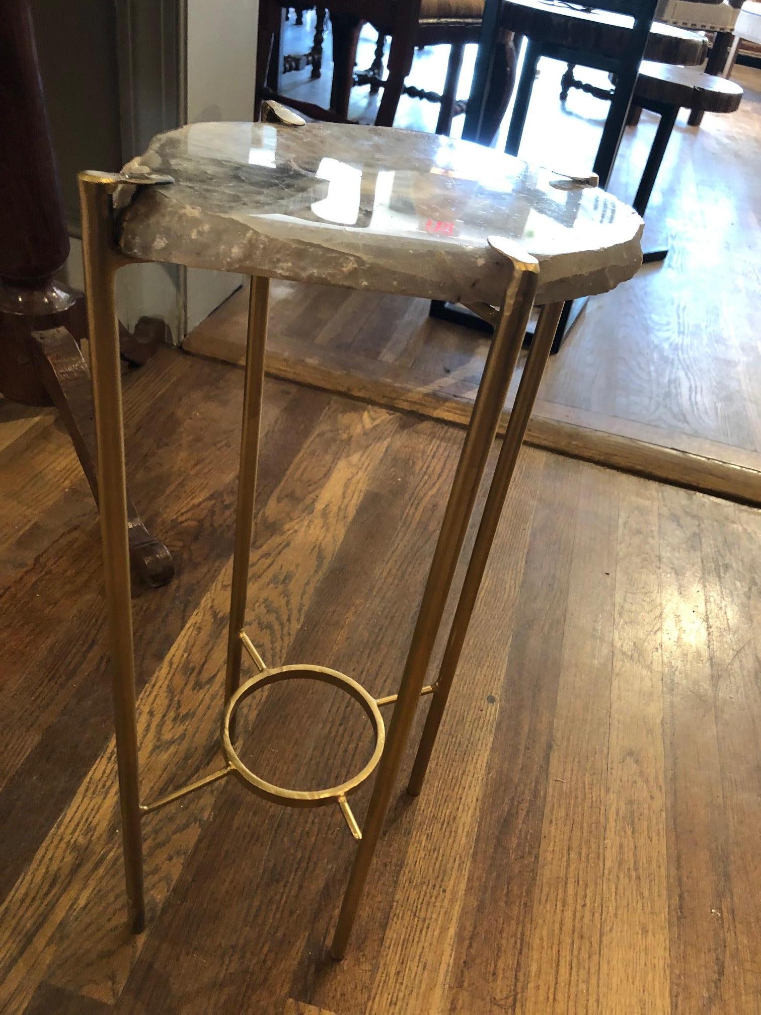 Unusual modern handcrafted drinks table. Large Quartzite Geode top with gilded steel base.