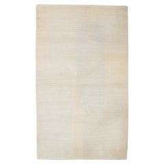 Tapis moderne à motifs géométriques en laine et soie de couleur blanc/argent